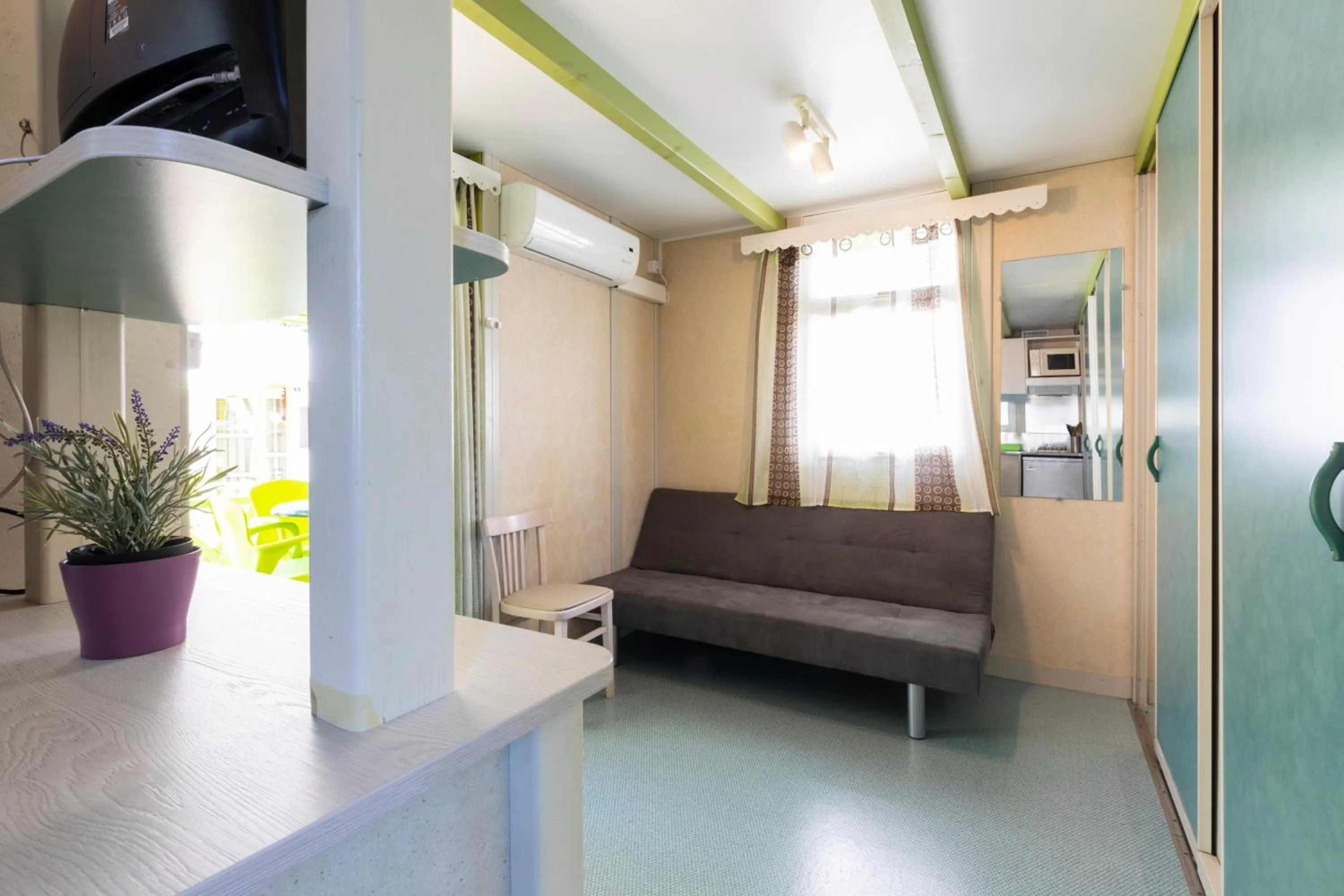 Living room in Camping Bungalows El Far