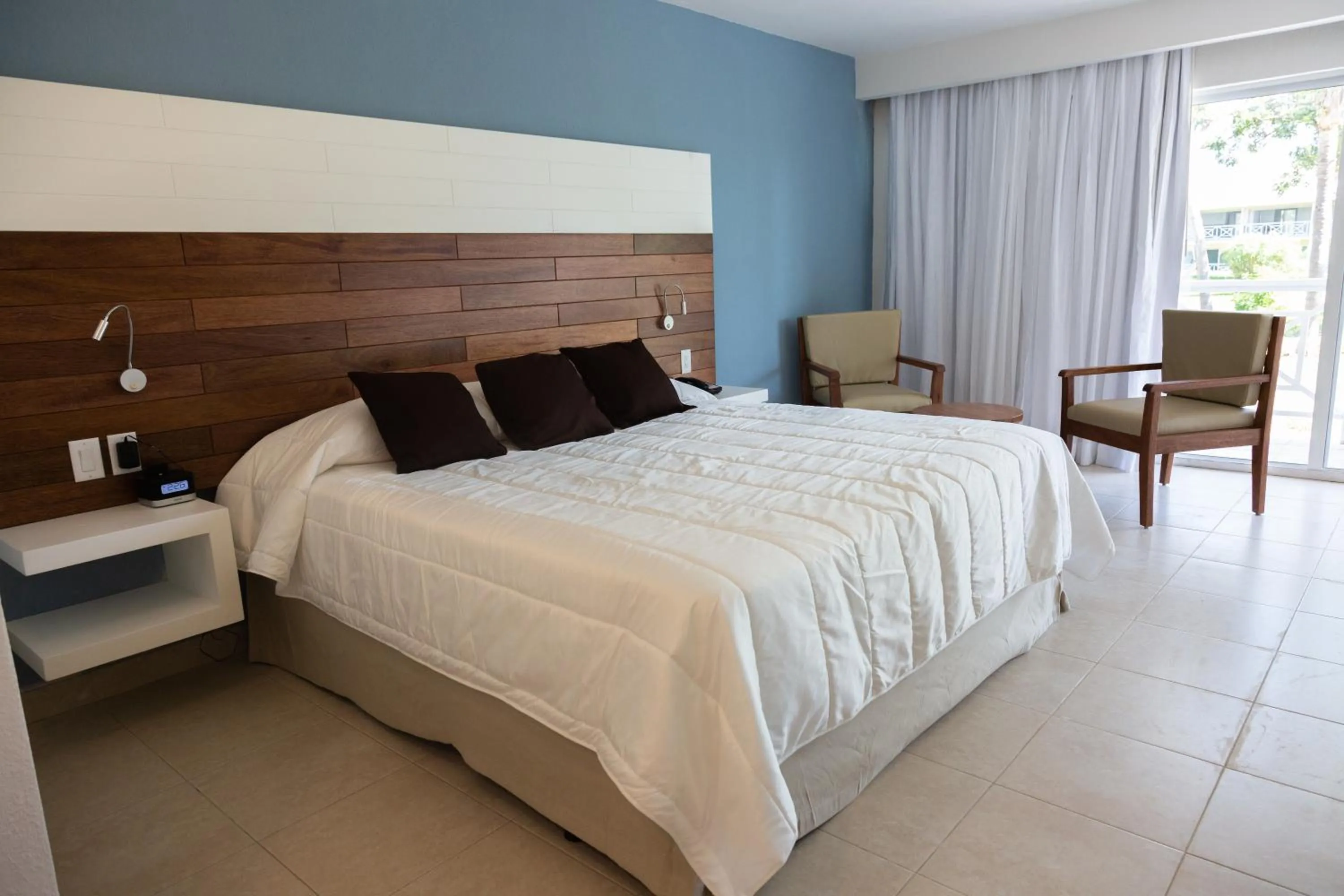 Bed in Viva Fortuna Beach by Wyndham, A Trademark All Inclusive