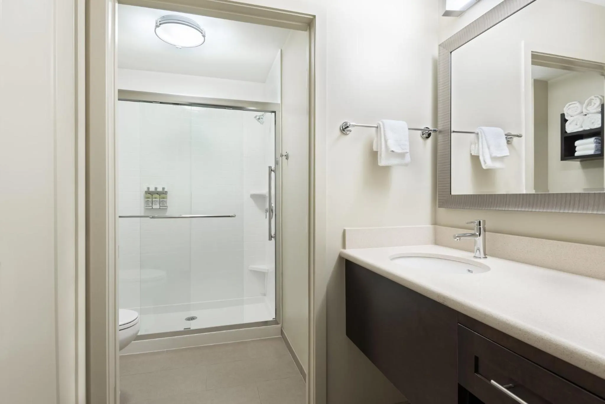 Bathroom in Staybridge Suites - Miami International Airport by IHG