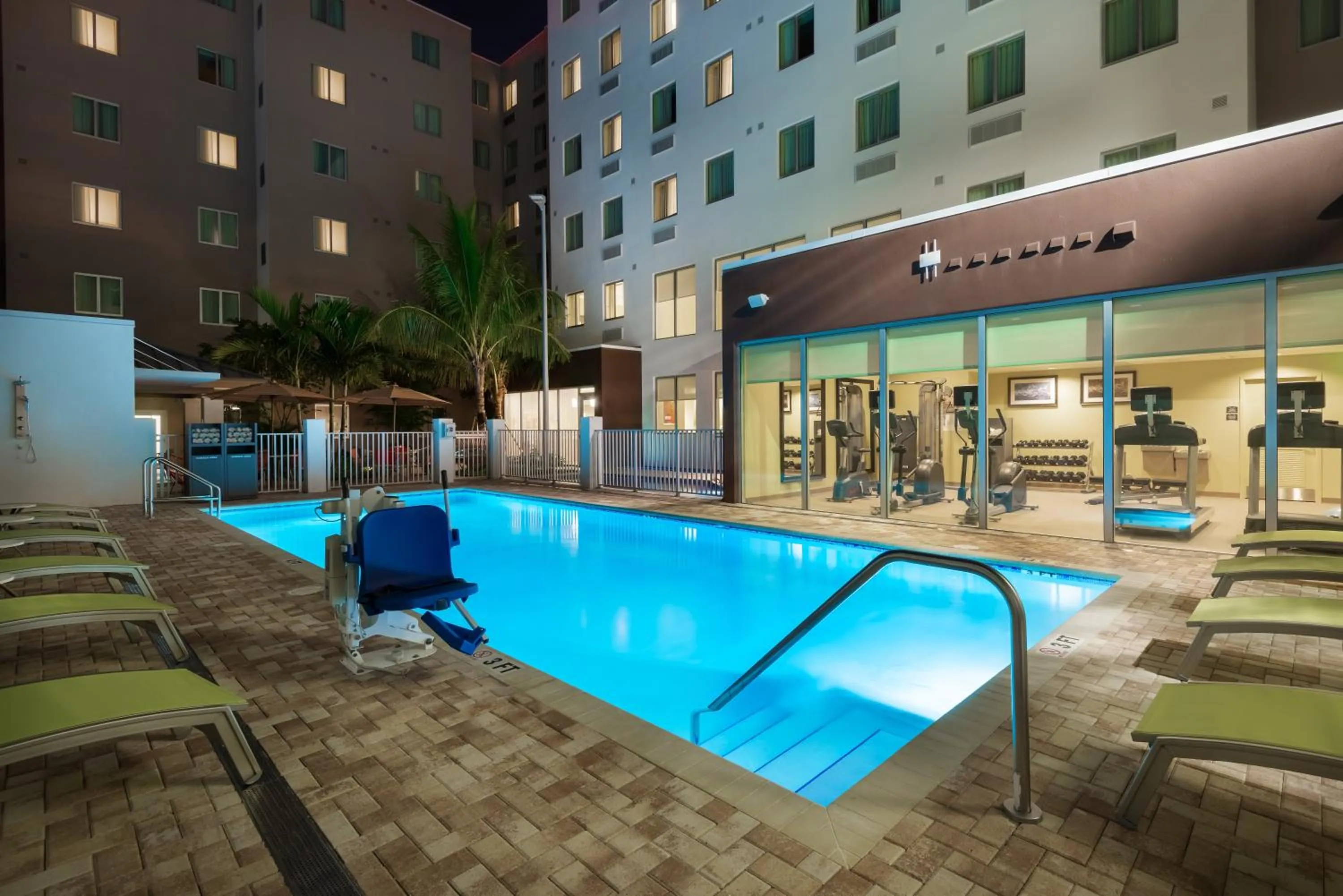 Swimming pool in Staybridge Suites - Miami International Airport by IHG