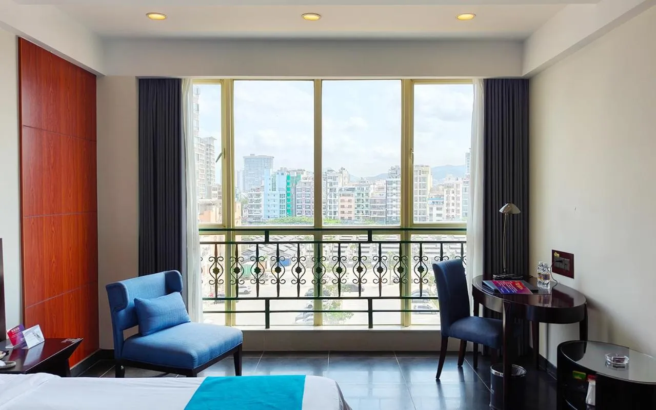 Seating area, Bed in Shengyi Holiday Villa Hotel