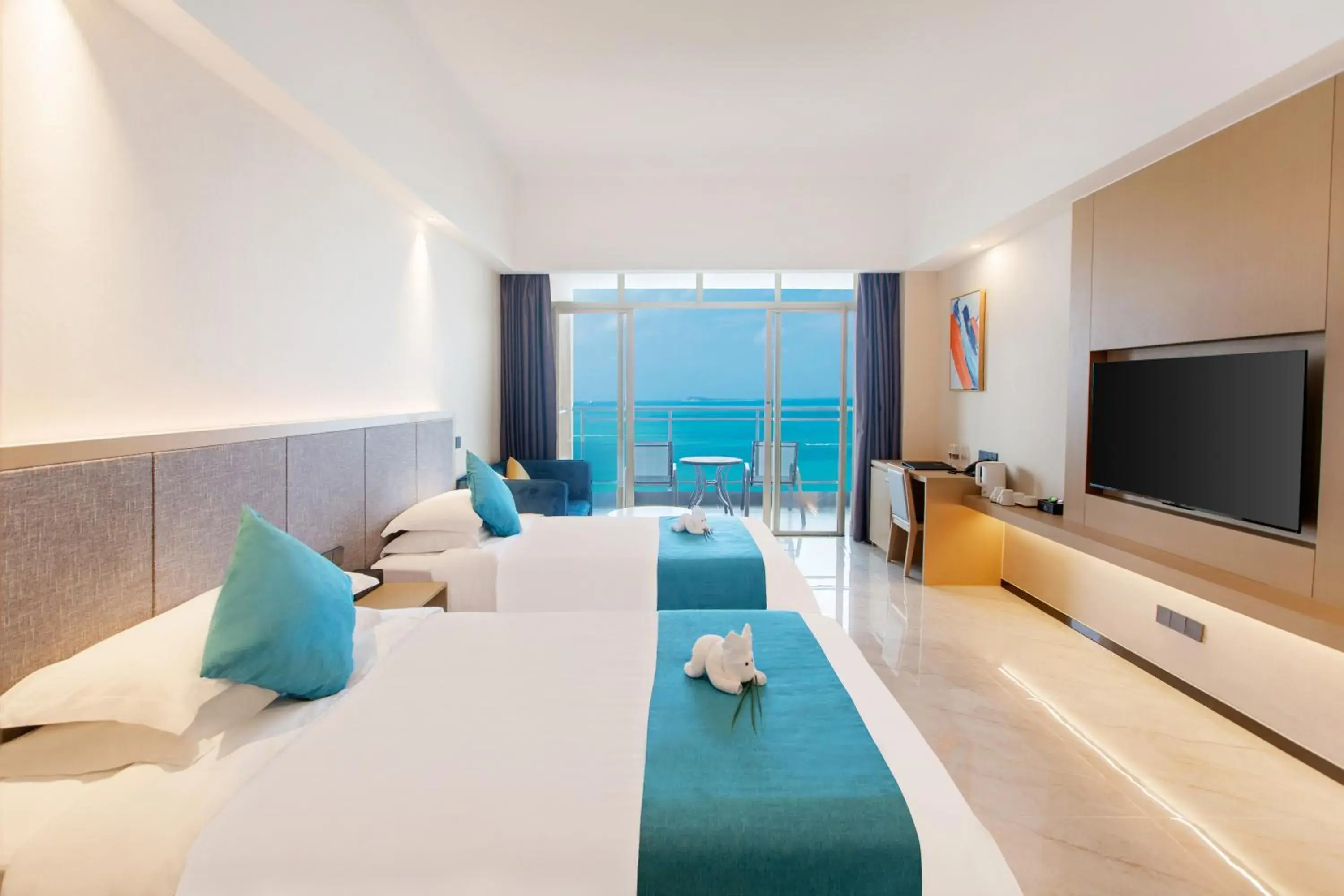 Deluxe Twin Room with Balcony and Sea View in Shengyi Holiday Villa Hotel Deluxe Twin Room with Balcony and Sea View in Shengyi Holiday Villa Hotel