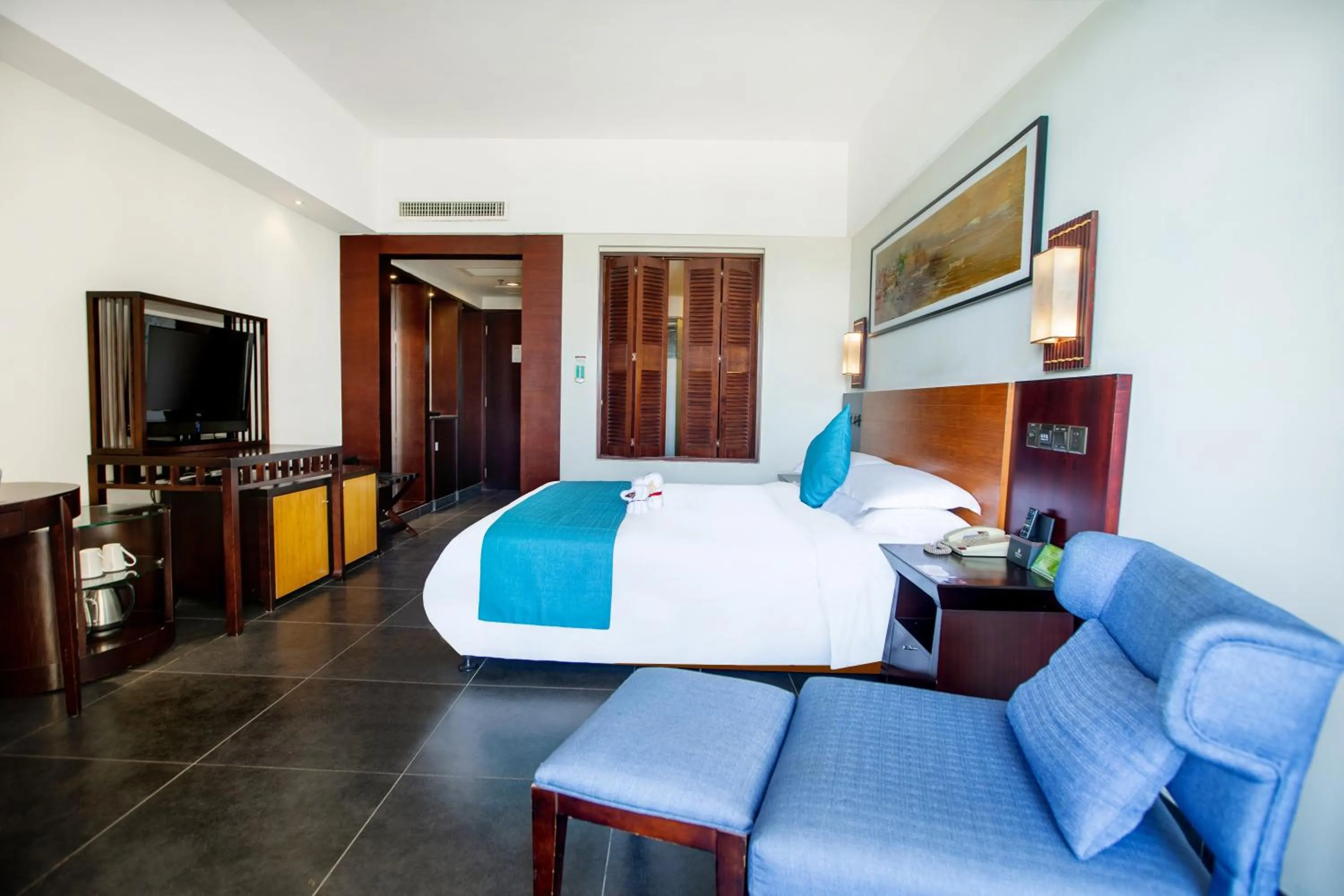 Bed in Shengyi Holiday Villa Hotel