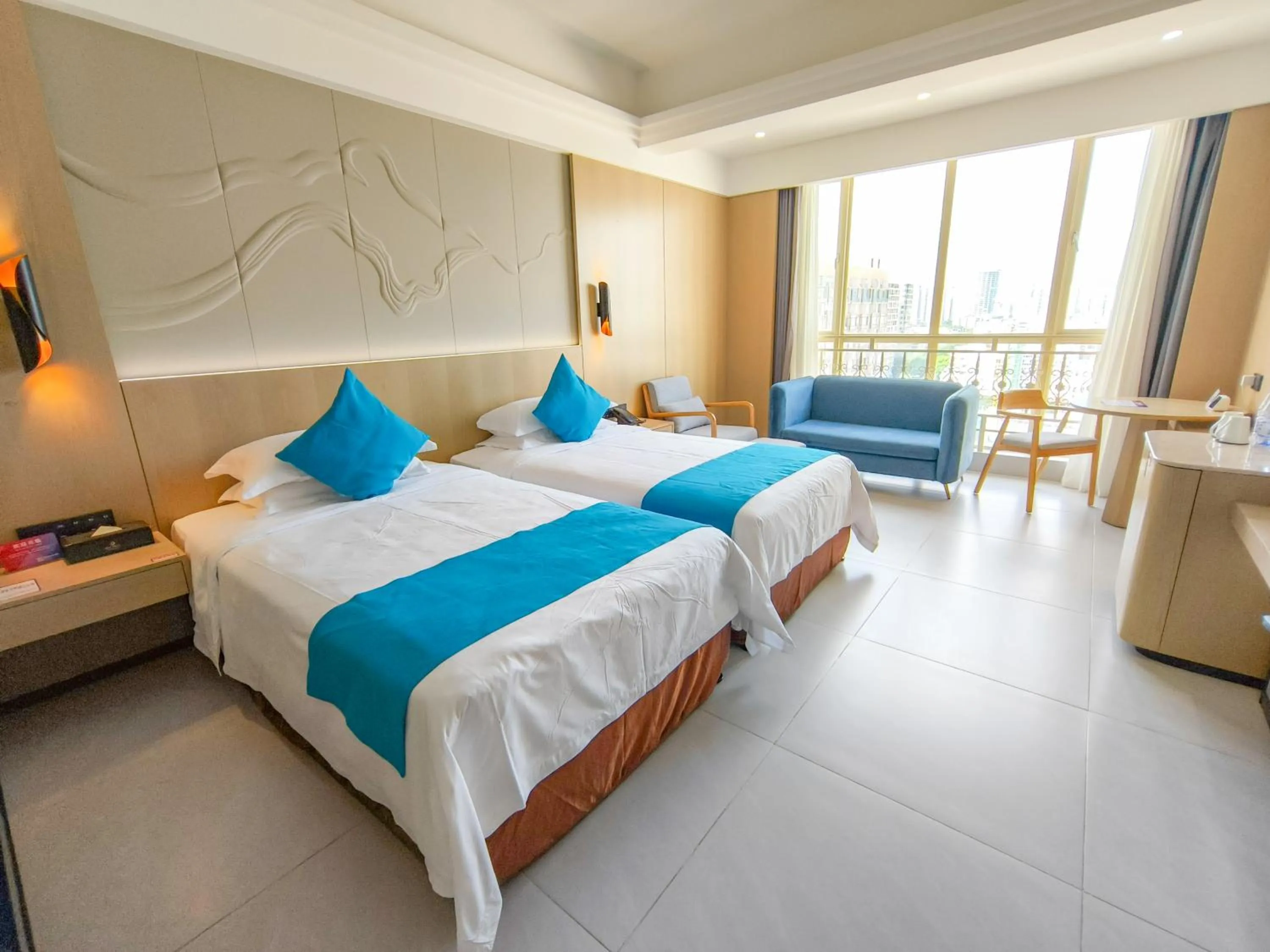 Bed in Shengyi Holiday Villa Hotel