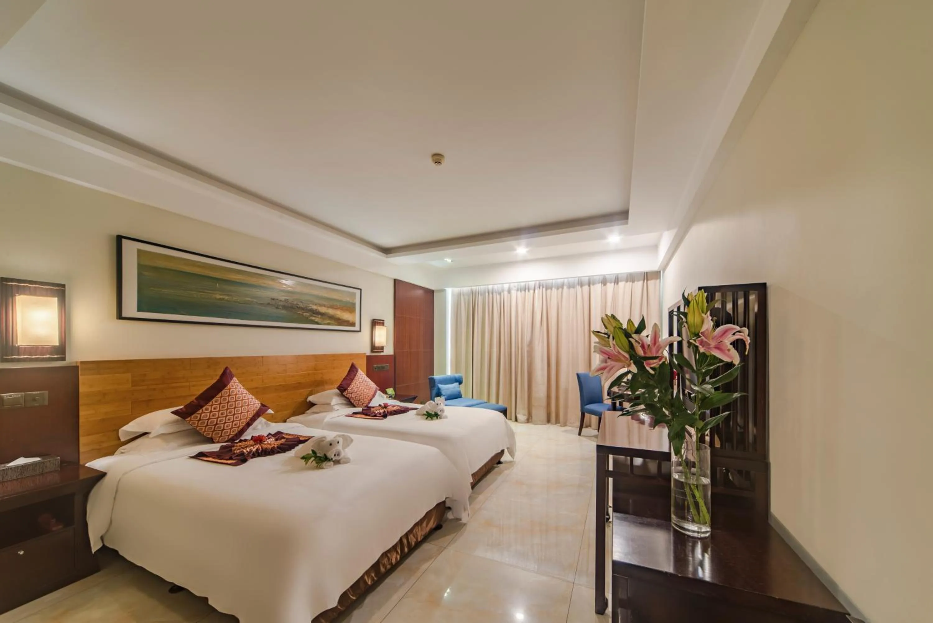 Bed in Shengyi Holiday Villa Hotel