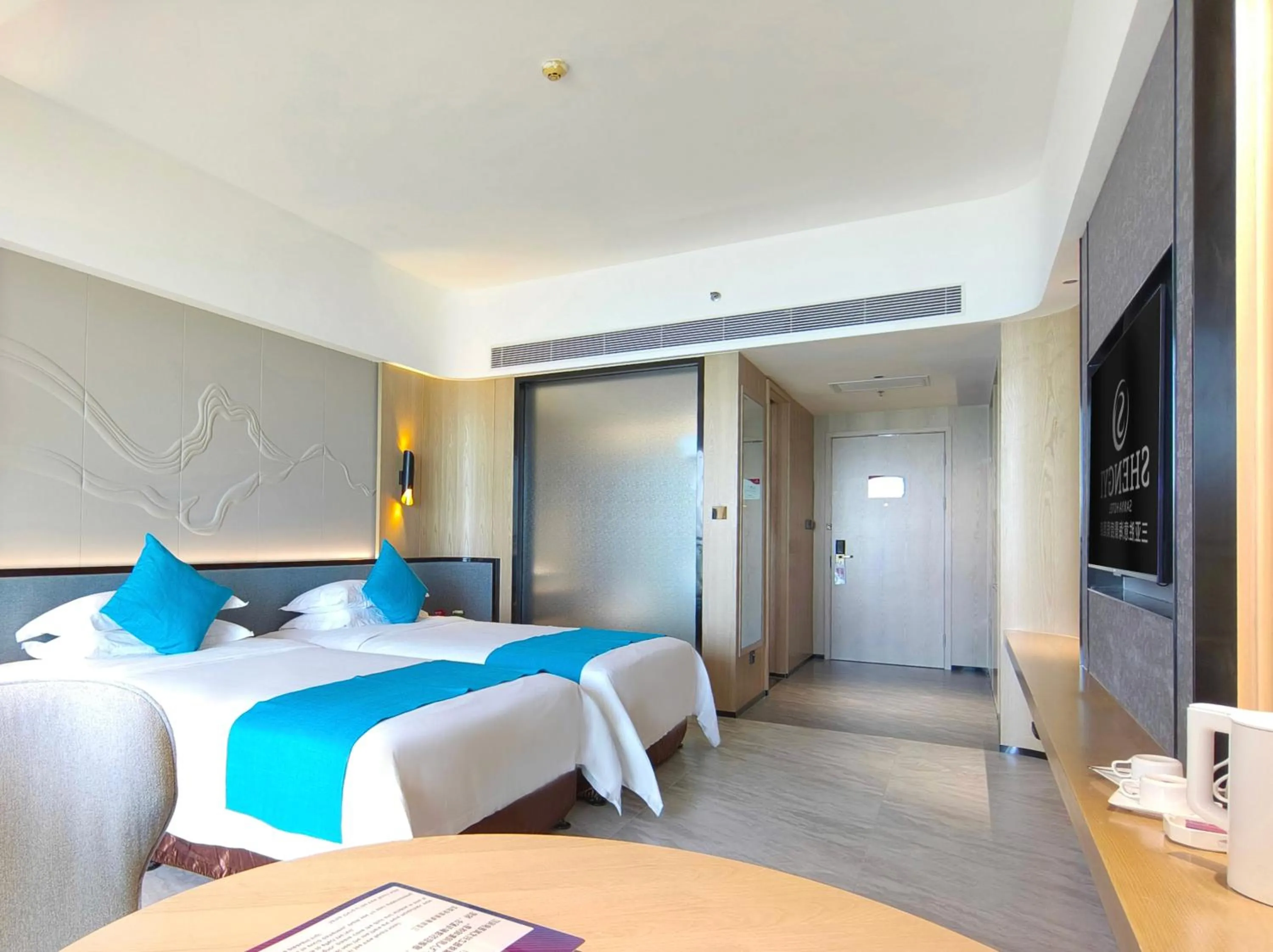 Bed in Shengyi Holiday Villa Hotel