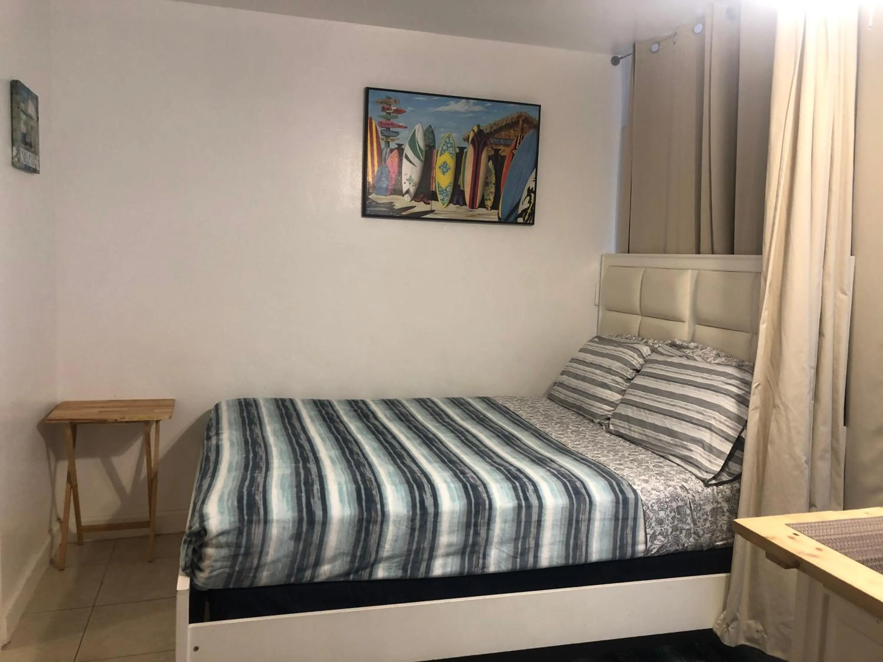 Bed in Hollywood Beachfront House