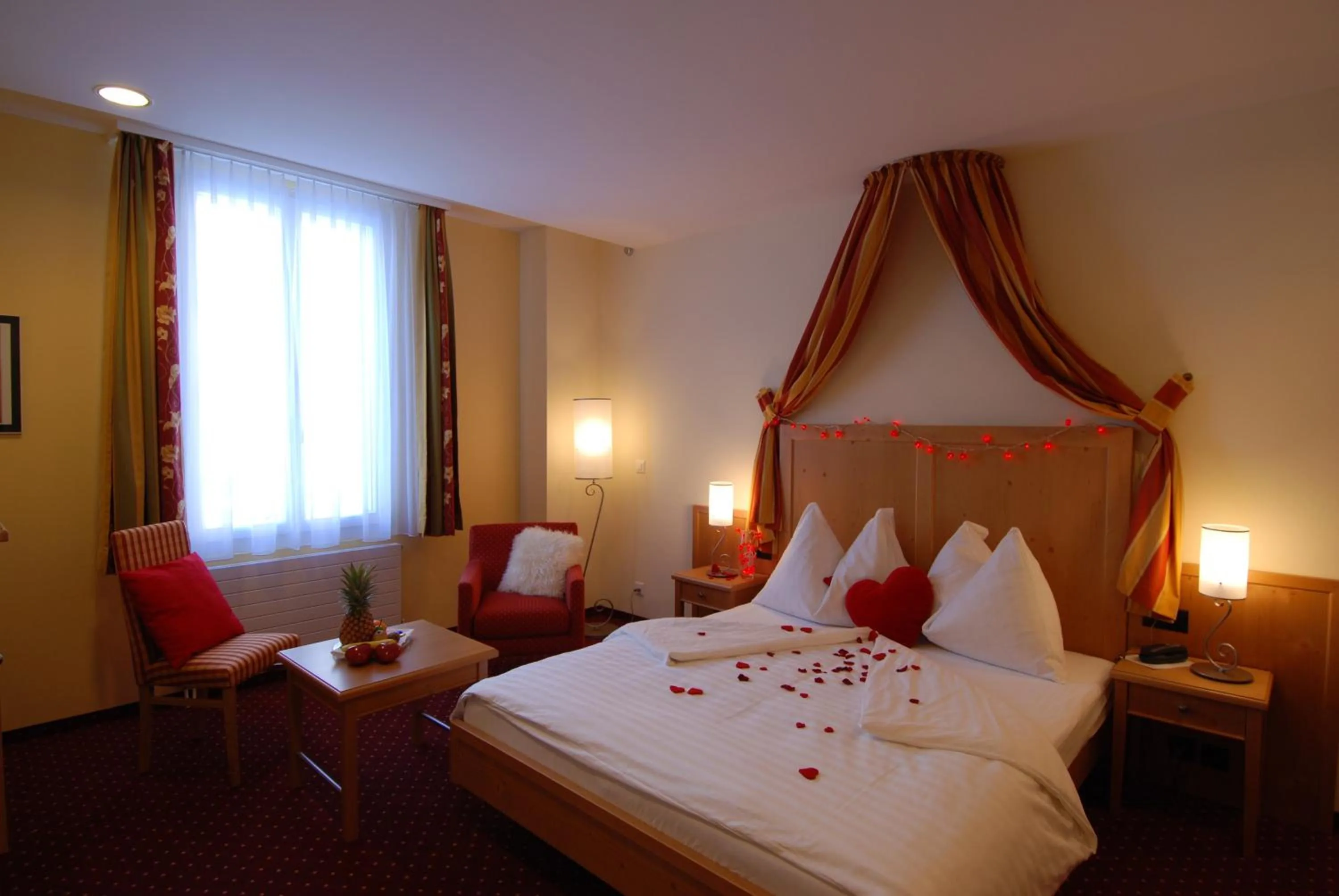 Photo of the whole room, Bed in Hotel Schweizerhof
