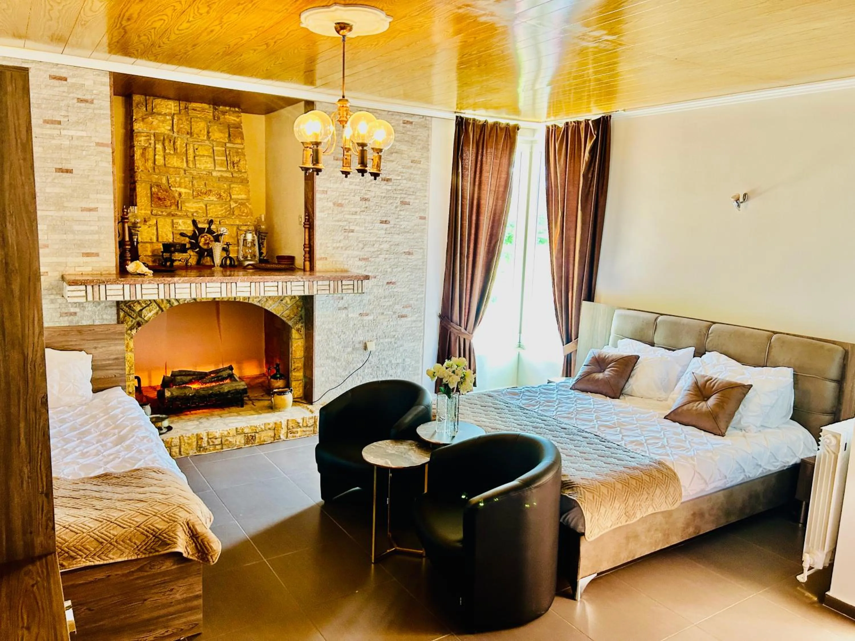 Living room, Bed in Hotel Lagadin