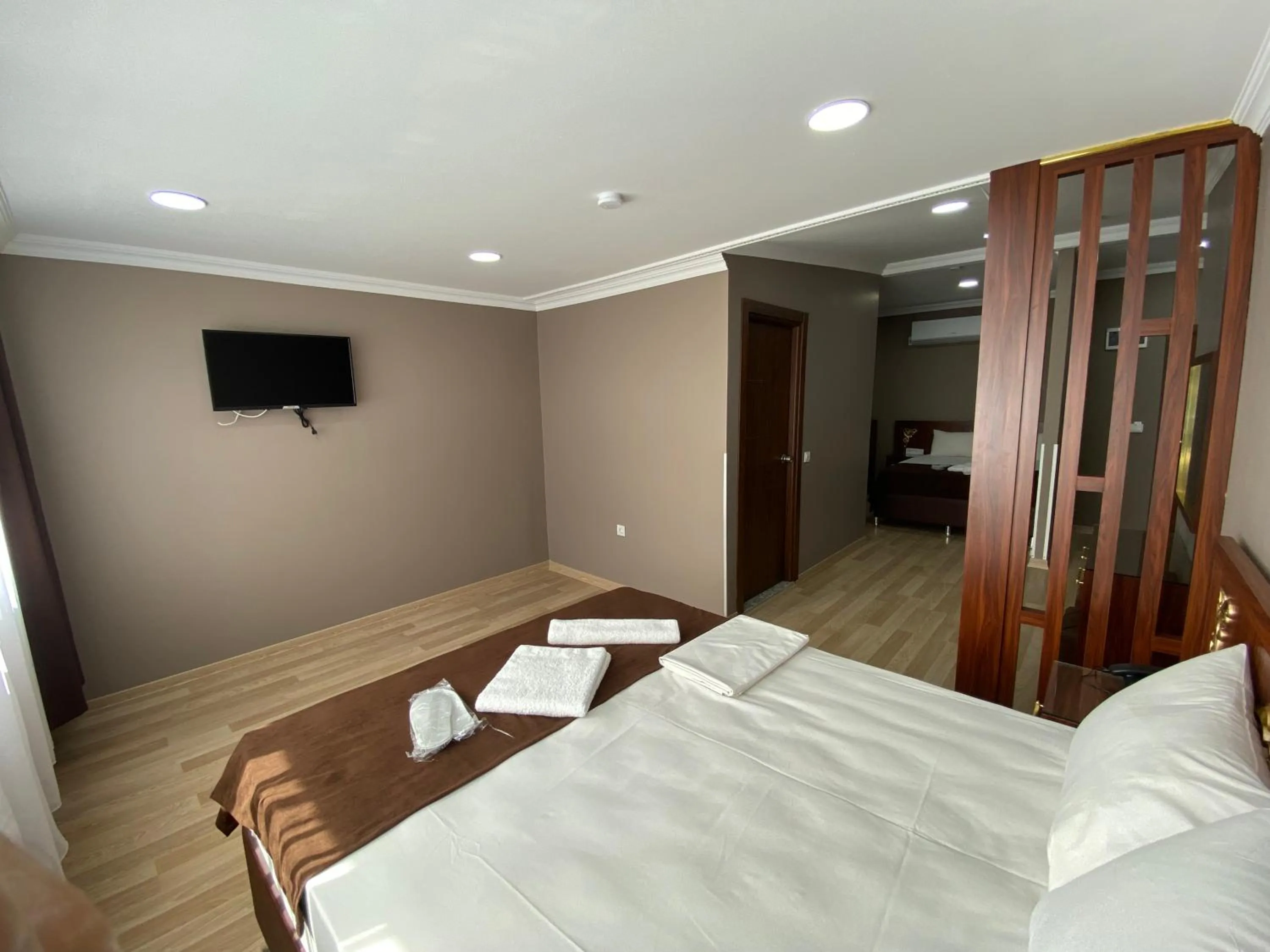 Bed in Grand Oral Hotel