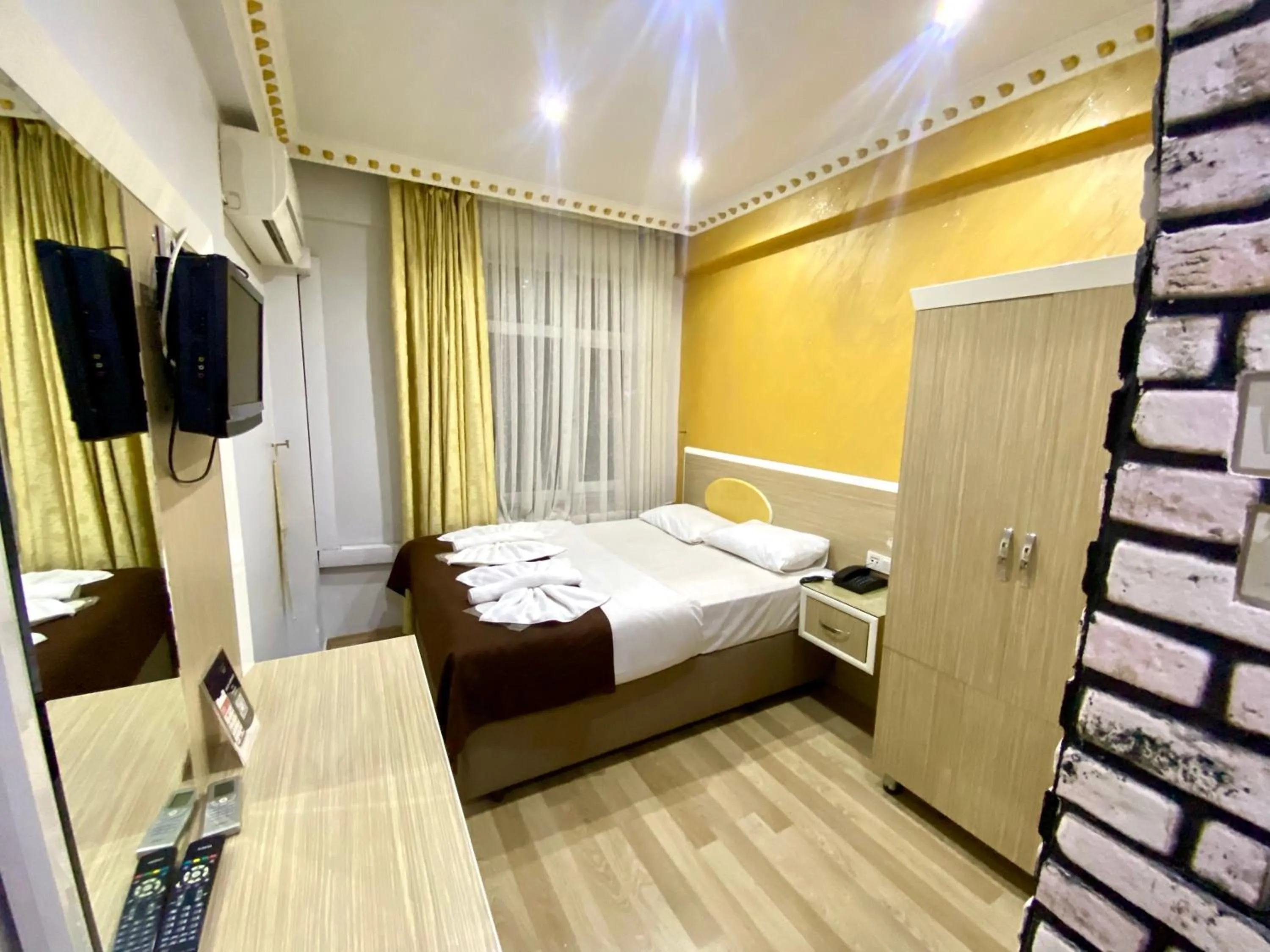 Bed in Grand Oral Hotel