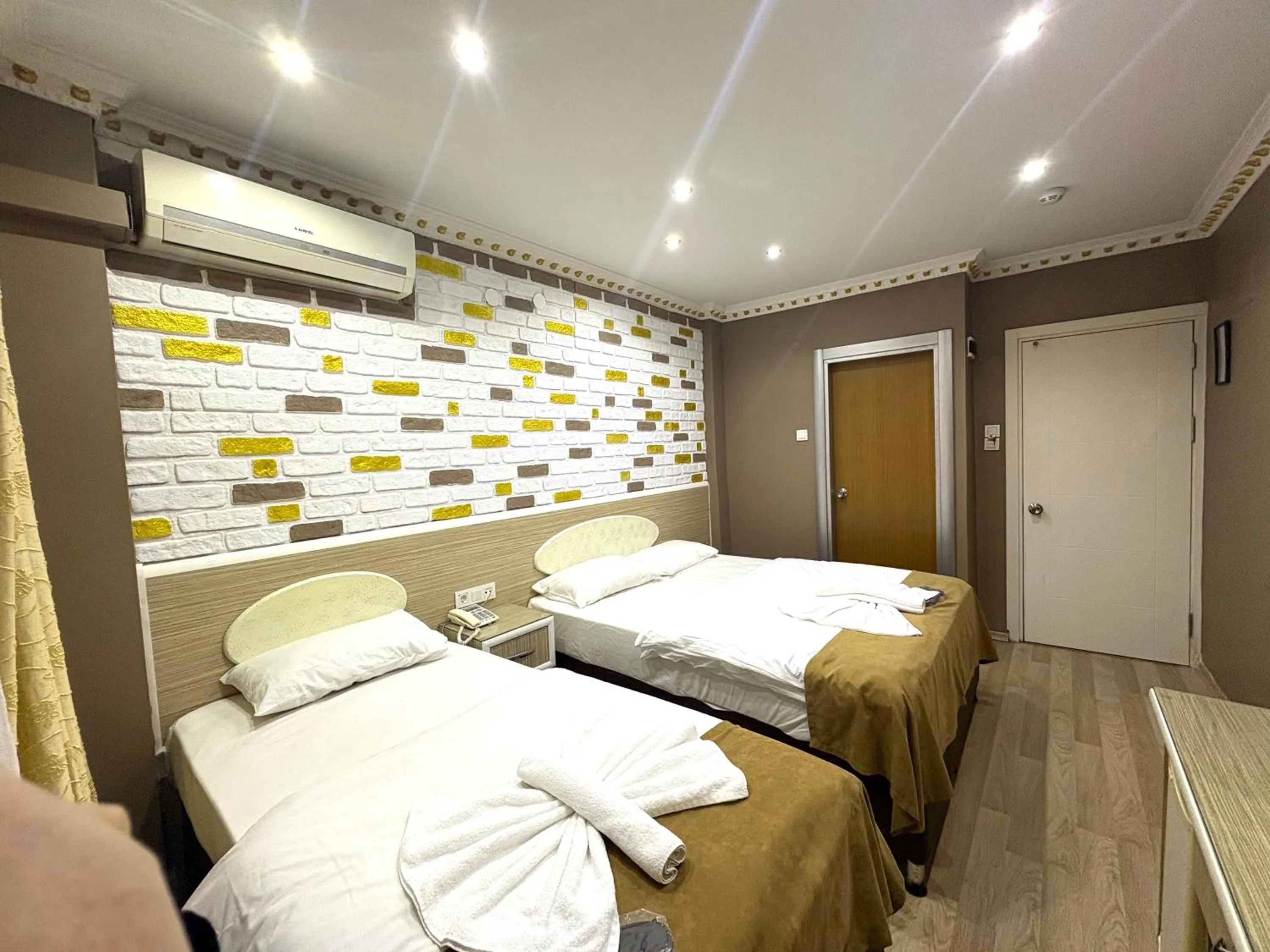 Bed in Grand Oral Hotel