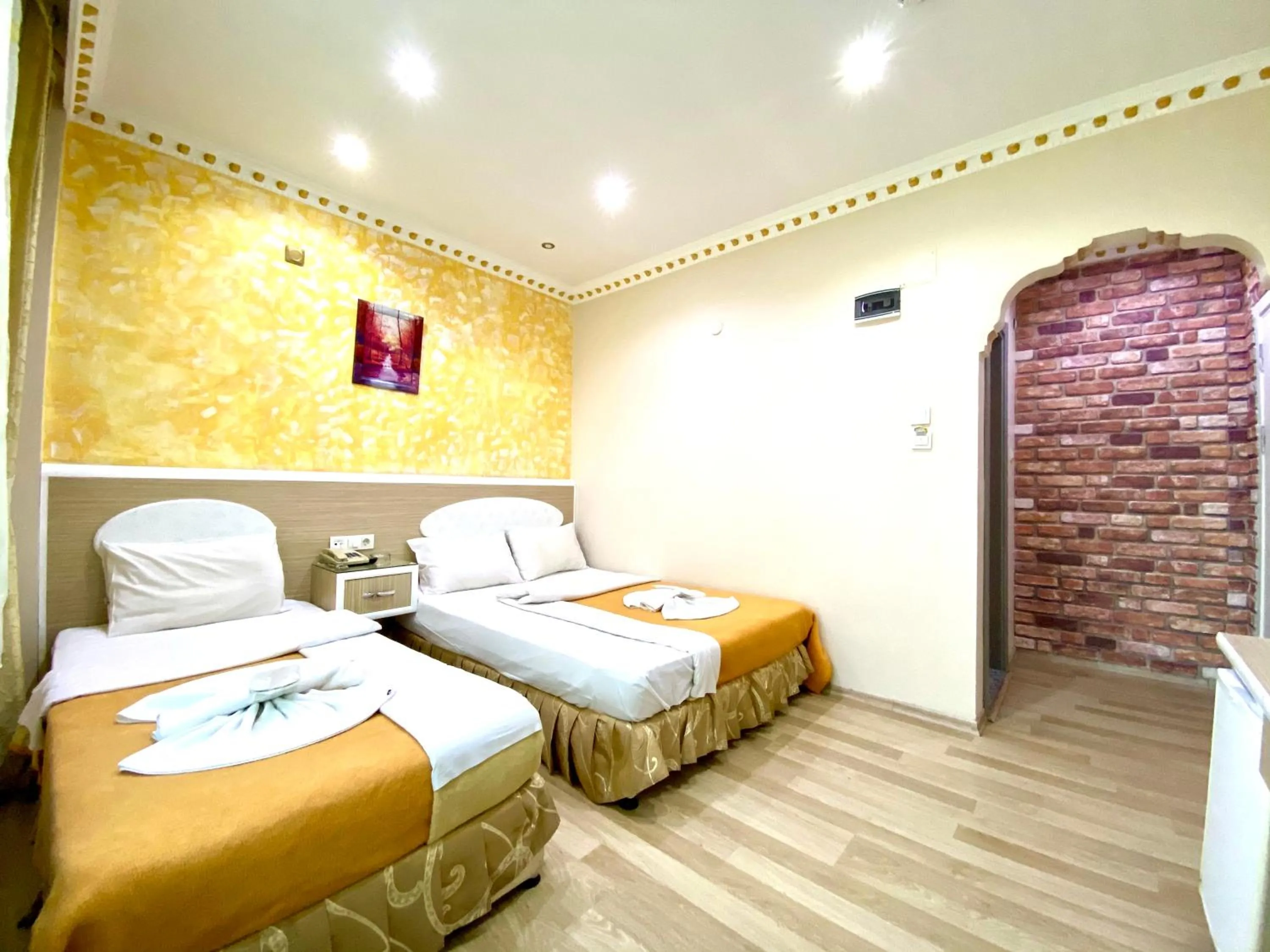 Bed in Grand Oral Hotel