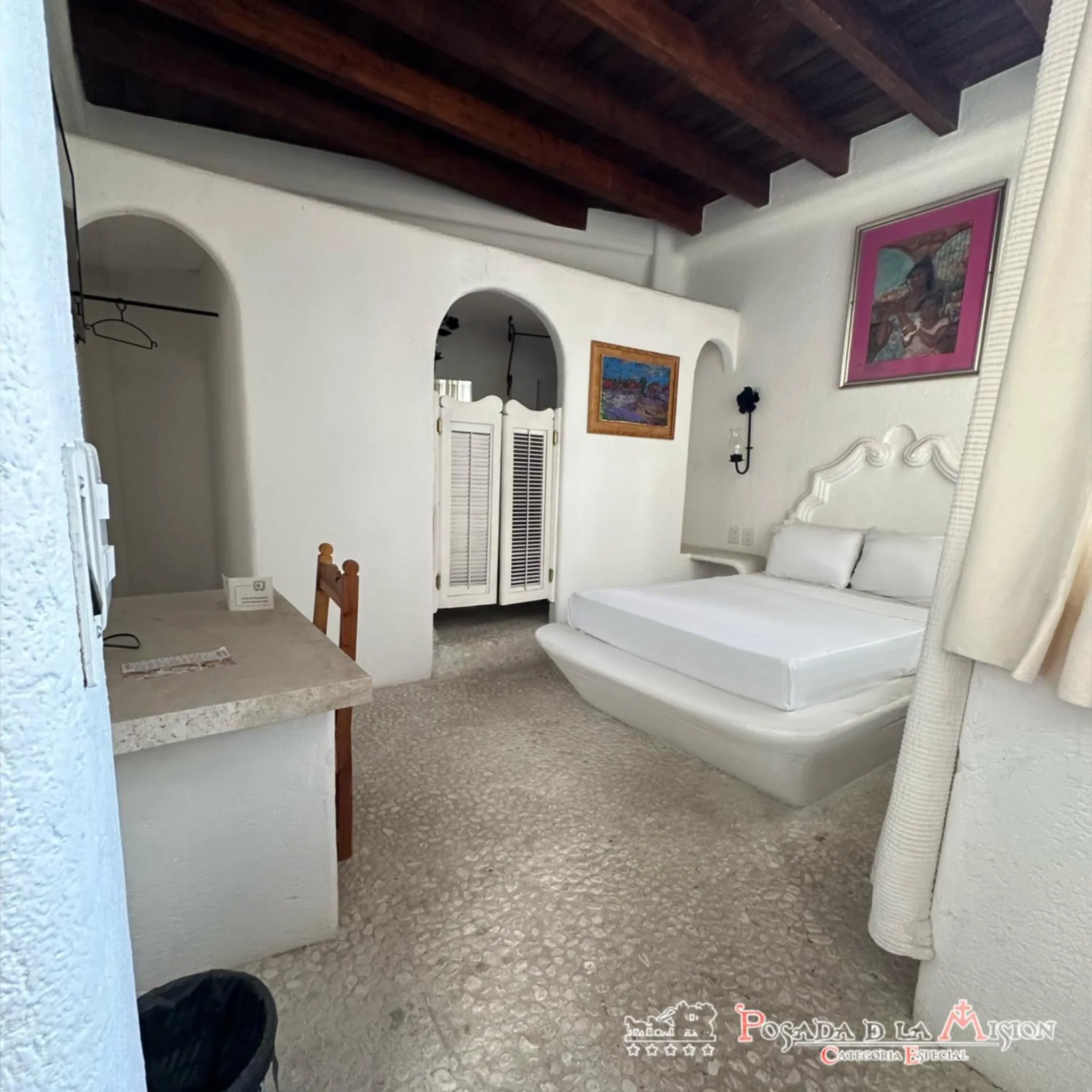 Bed in Posada de la Mision, Hotel Museo y Jardin