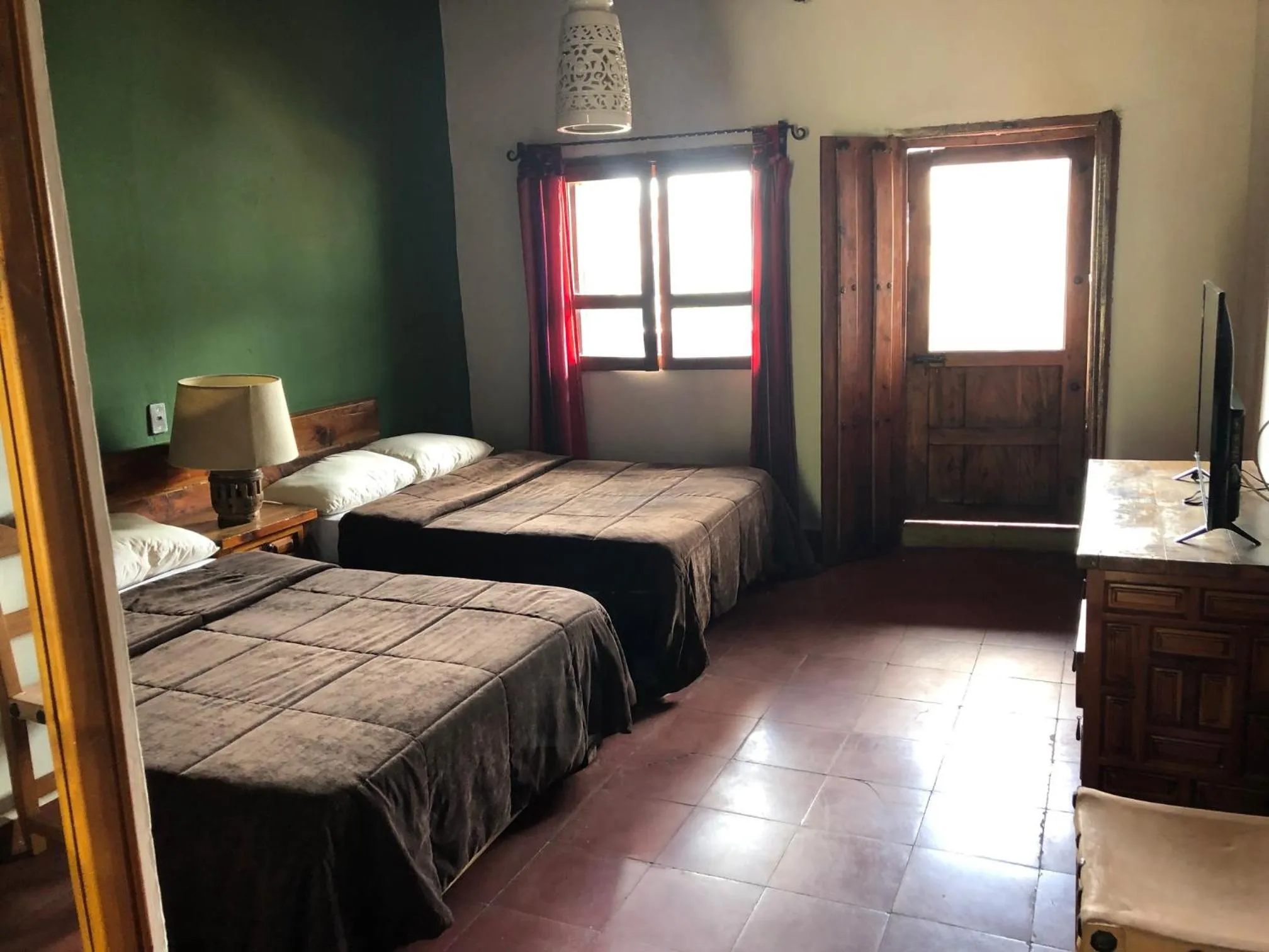 Bed in Posada de la Mision, Hotel Museo y Jardin