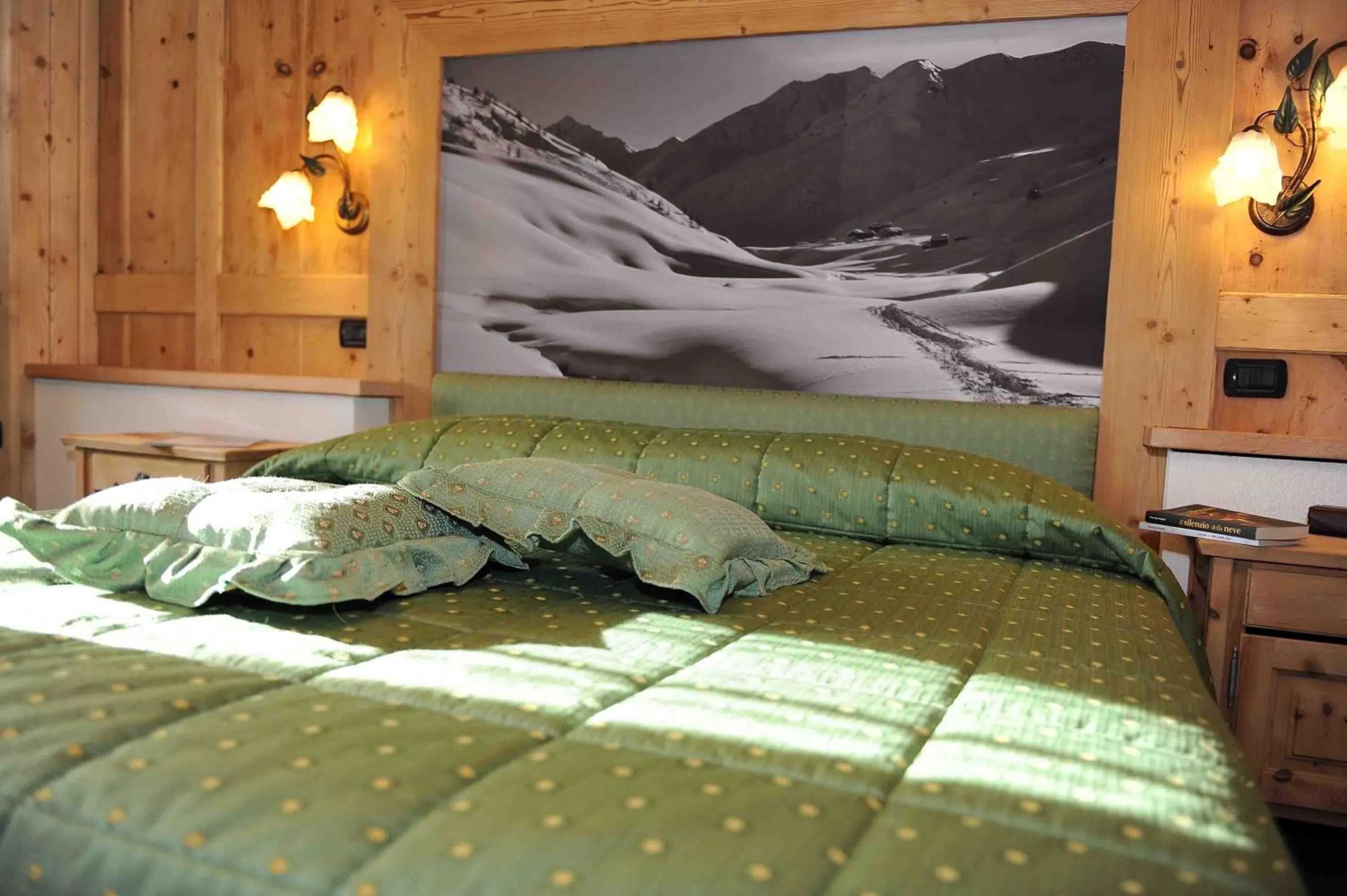 Bed in Hotel Alpina