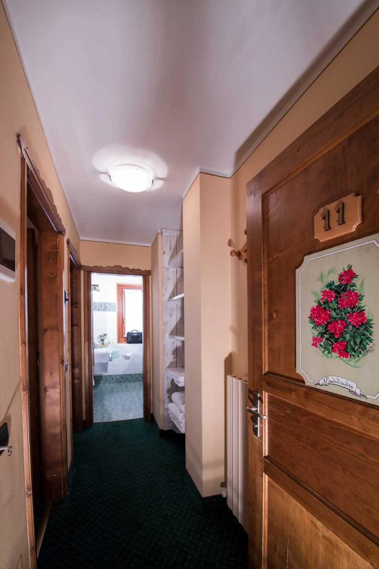 wardrobe, Bed in Hotel Alpina