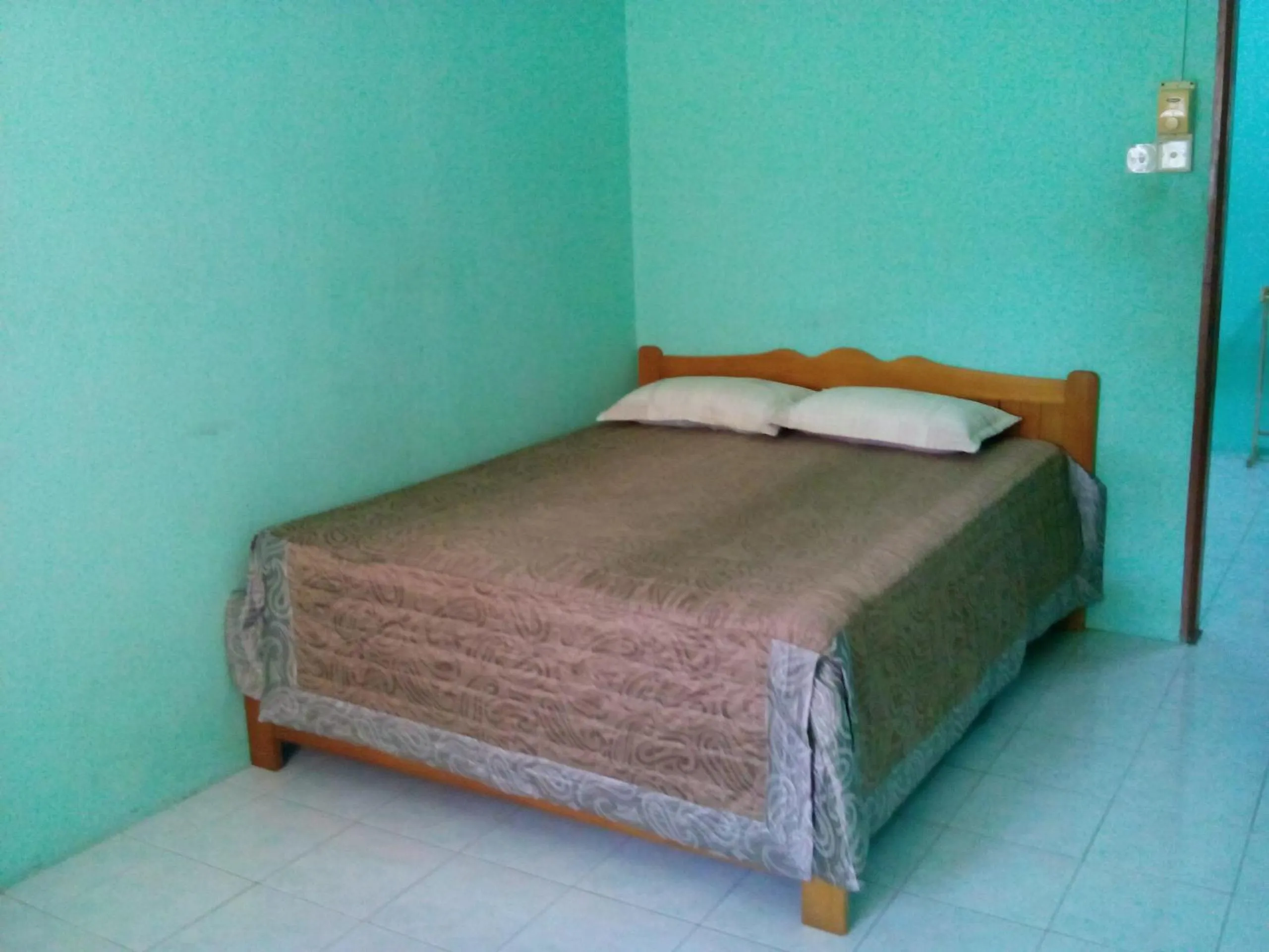Bed in Shima Homestay