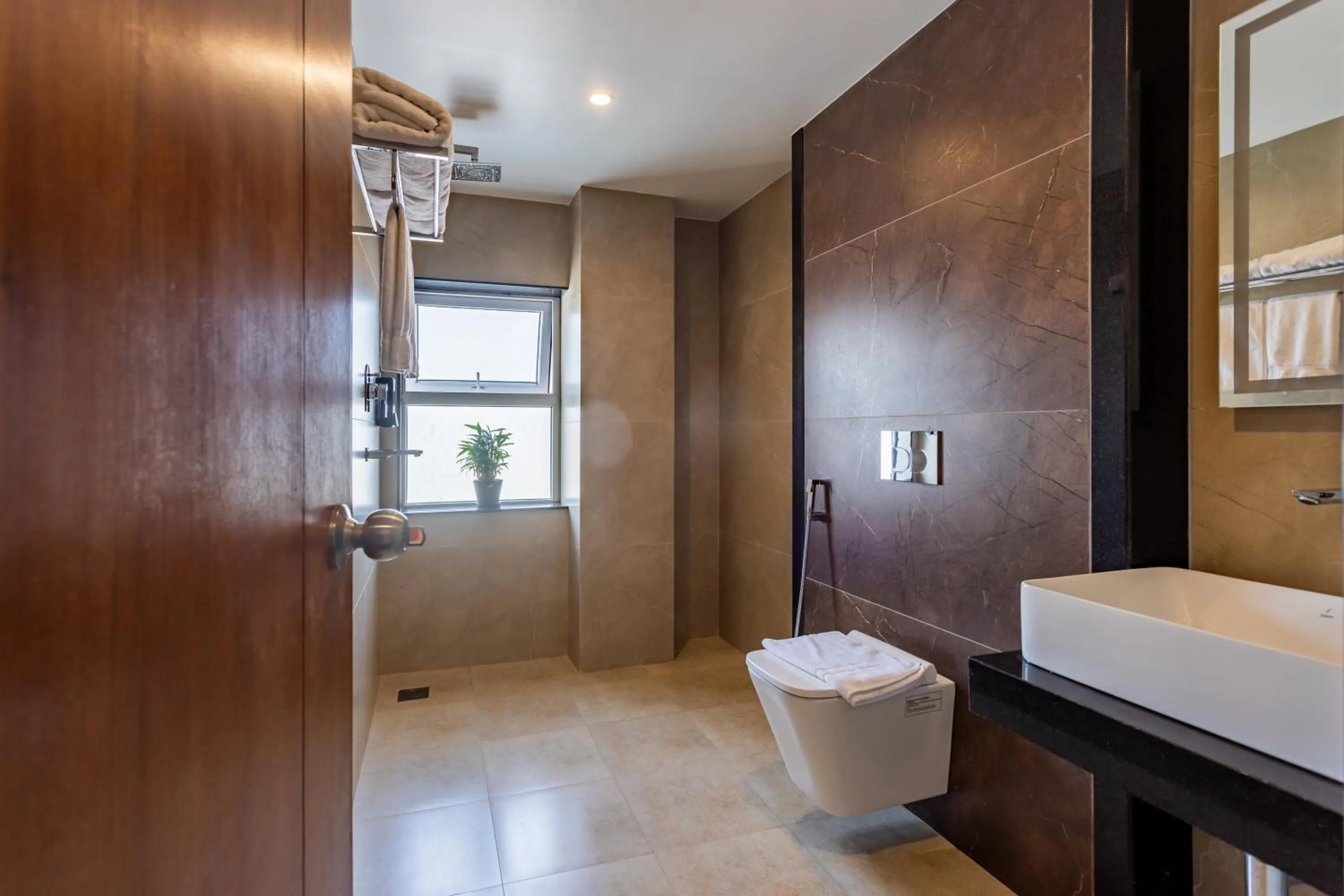 Shower in Timber House by Tara Group