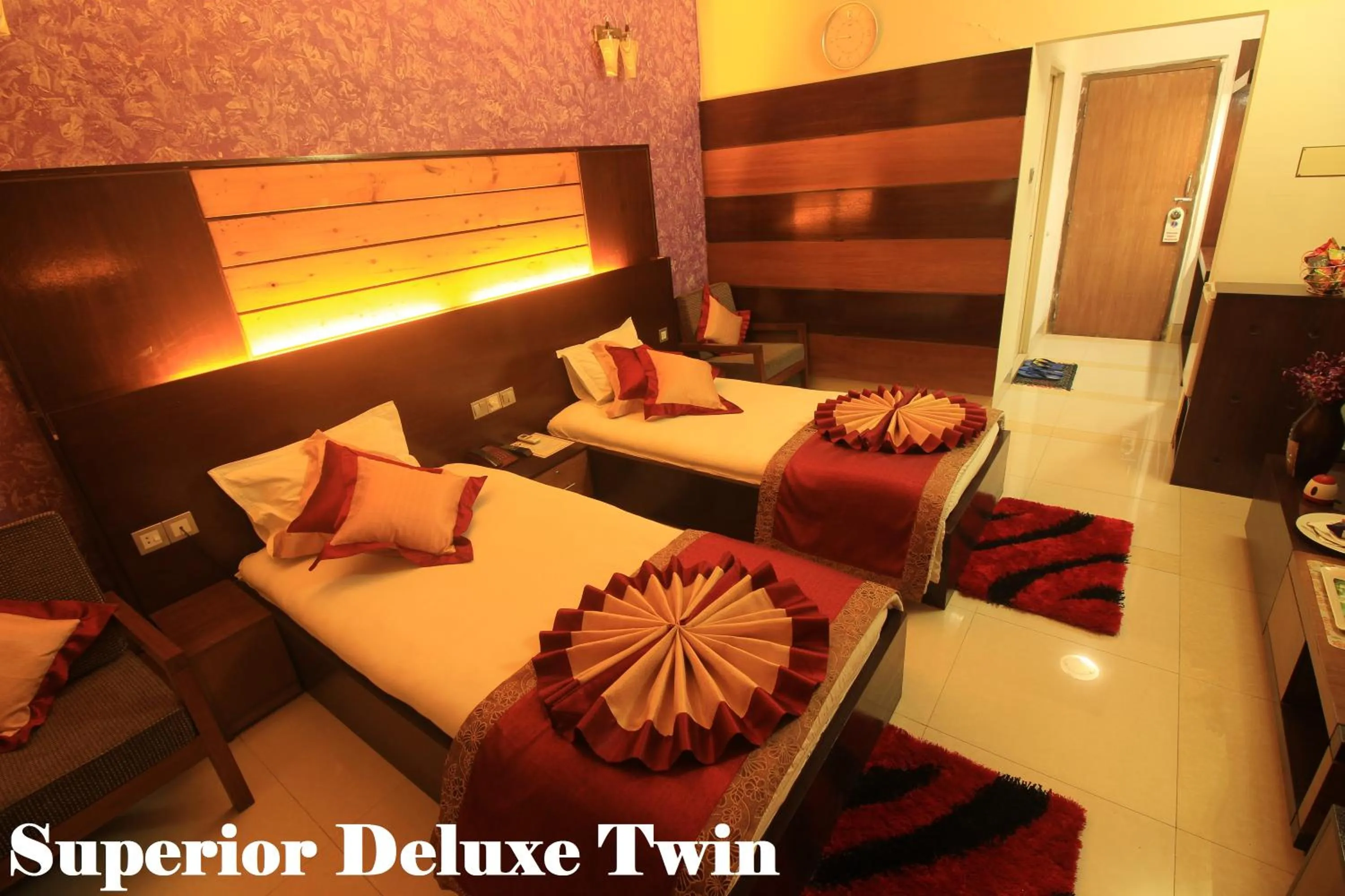 Bed in Tiger Garden Int Hotel