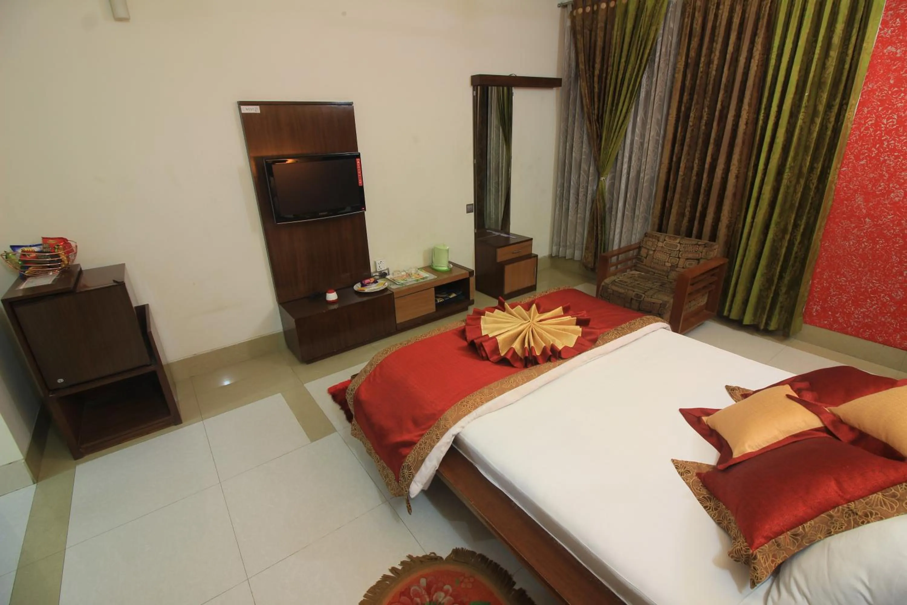 Bed in Tiger Garden Int Hotel