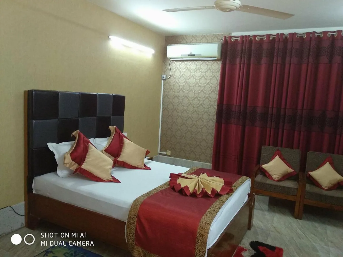 Bed in Tiger Garden Int Hotel