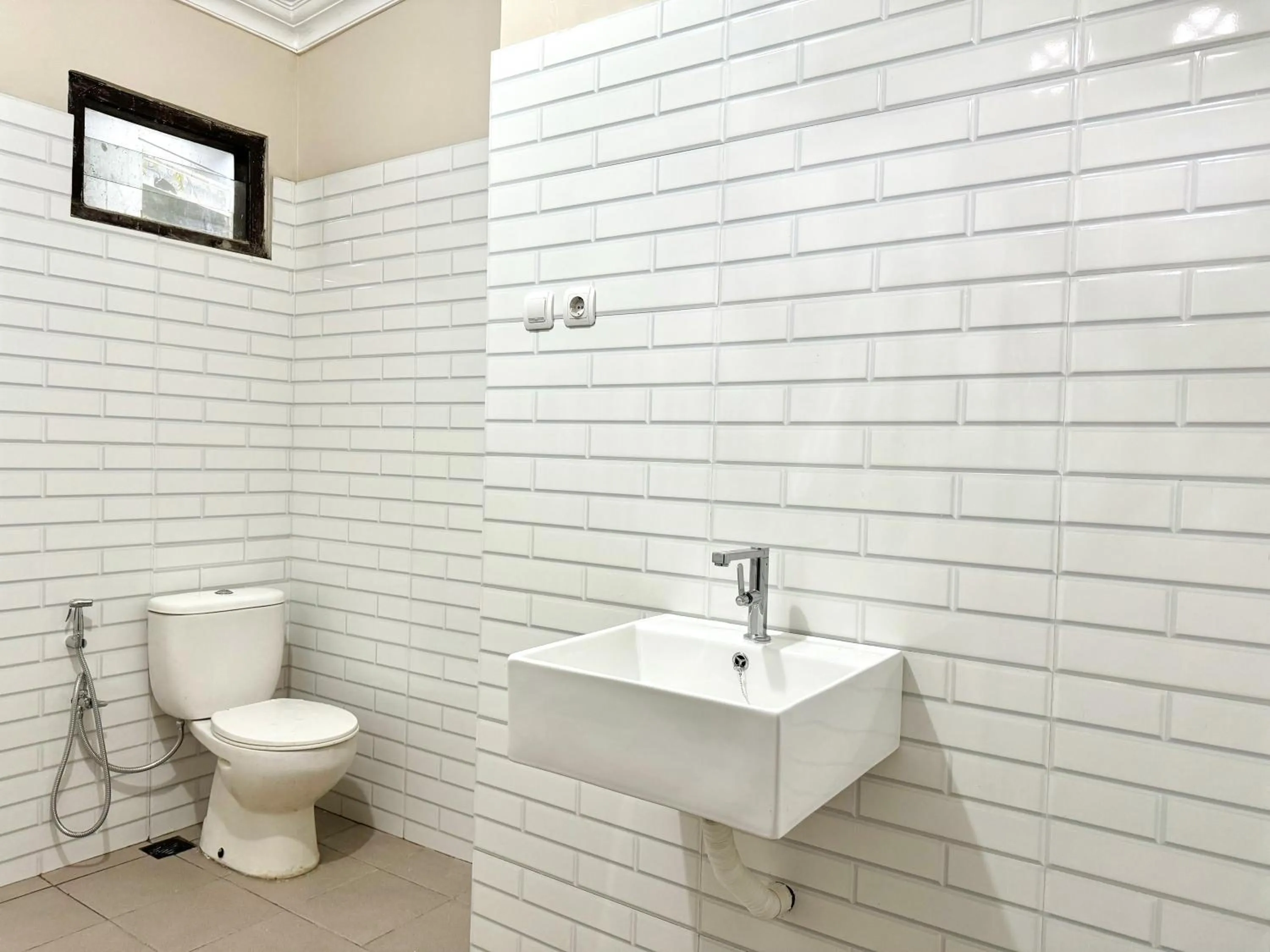 Bathroom in OWK Homestay Syariah Mitra RedDoorz Wonosobo