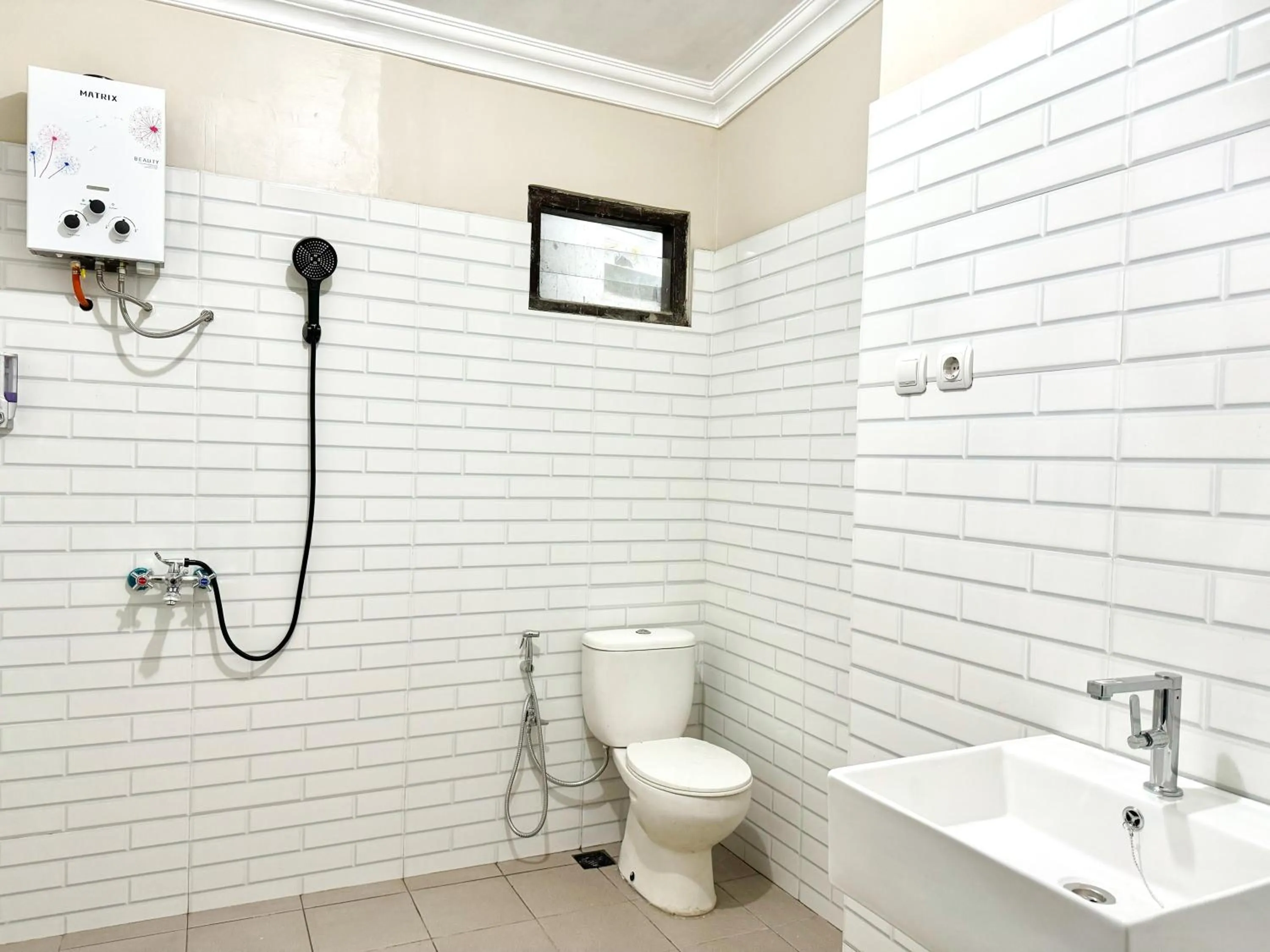 Bathroom in OWK Homestay Syariah Mitra RedDoorz Wonosobo