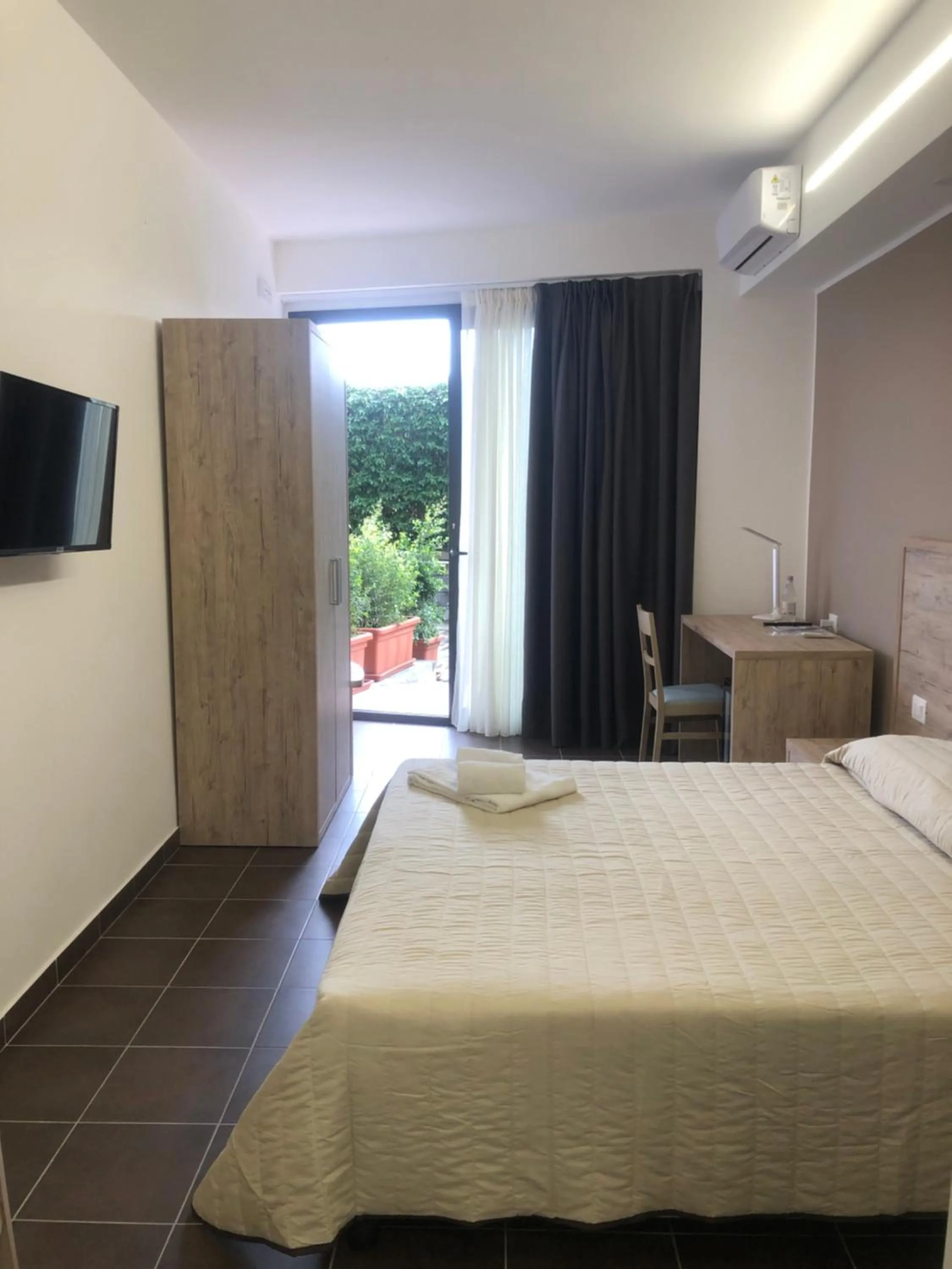 Bed in Atlantis Palace Hotel