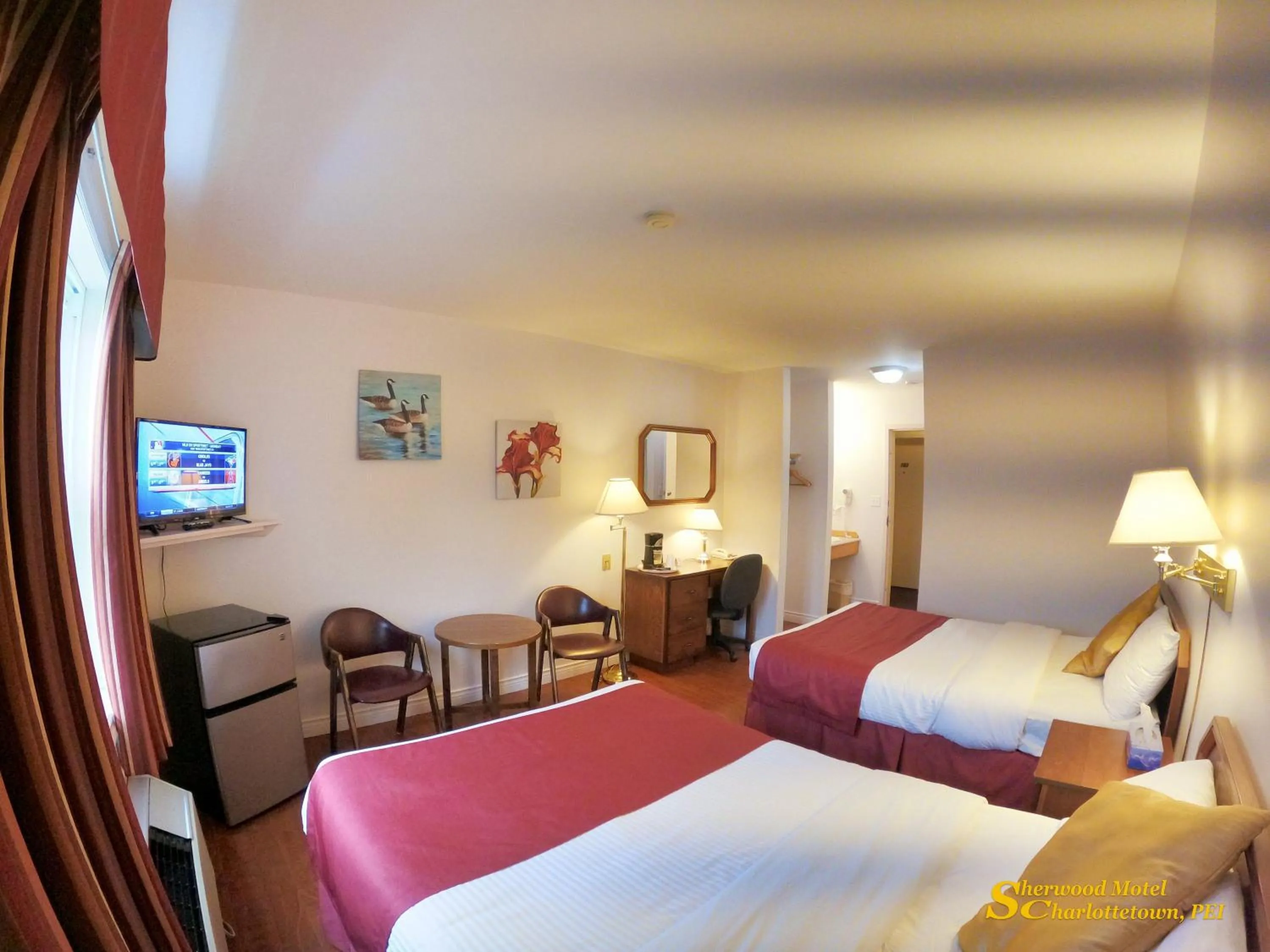 Bed in Sherwood Inn and Motel Charlottetown