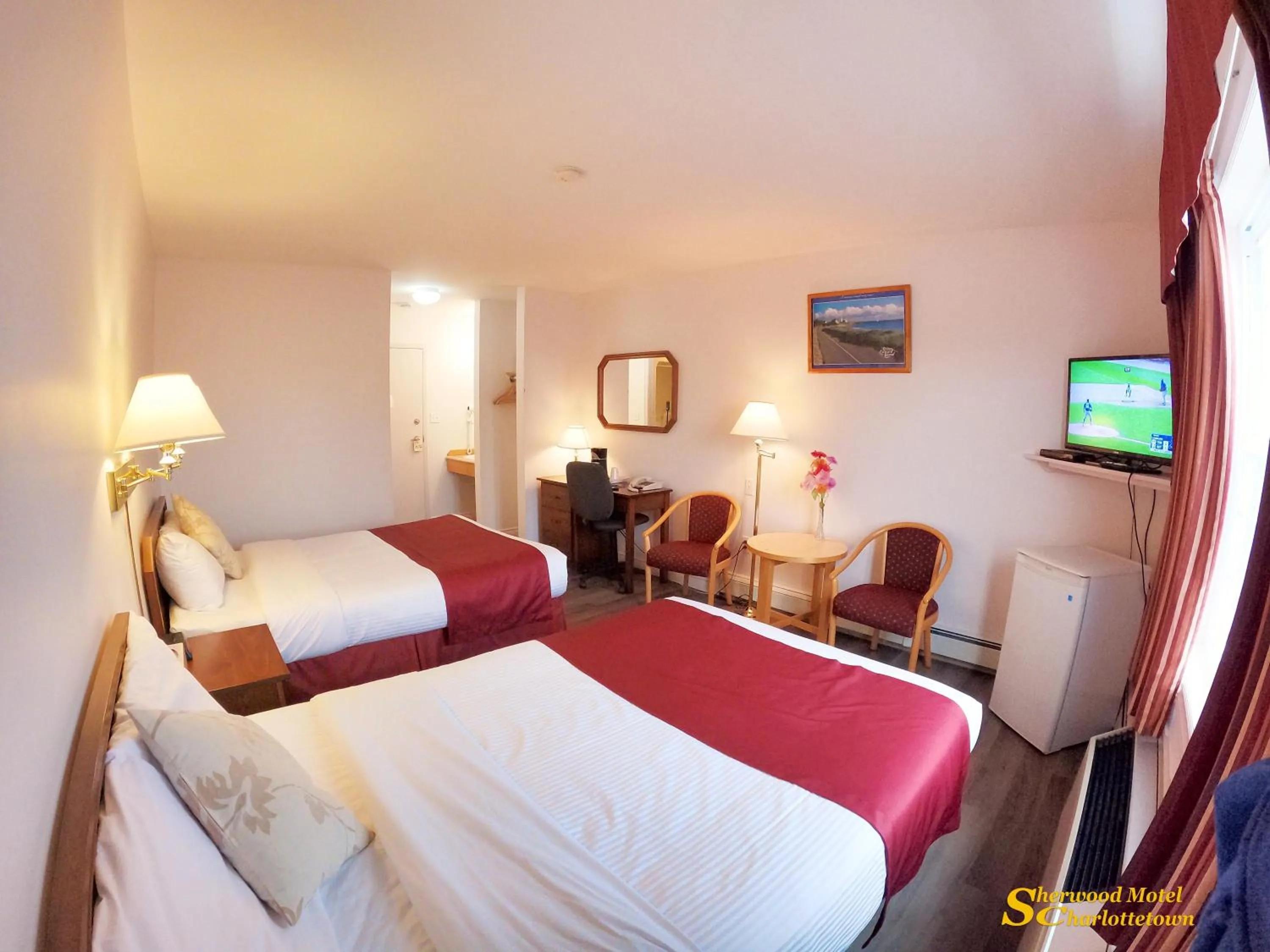 Bed in Sherwood Inn and Motel Charlottetown