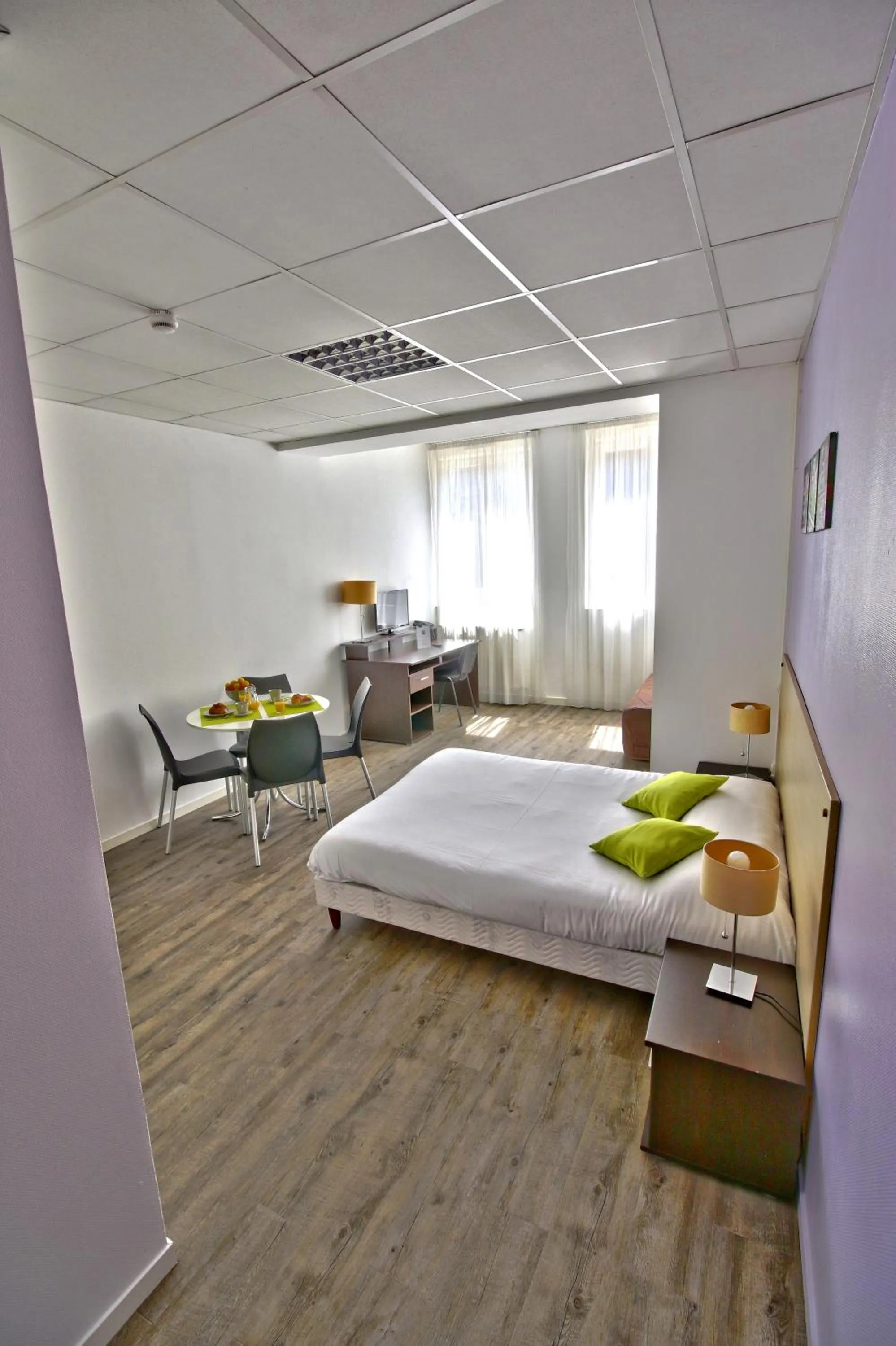 Photo of the whole room, Bed in KOSY Appart'Hôtels - Le Cours Moreau