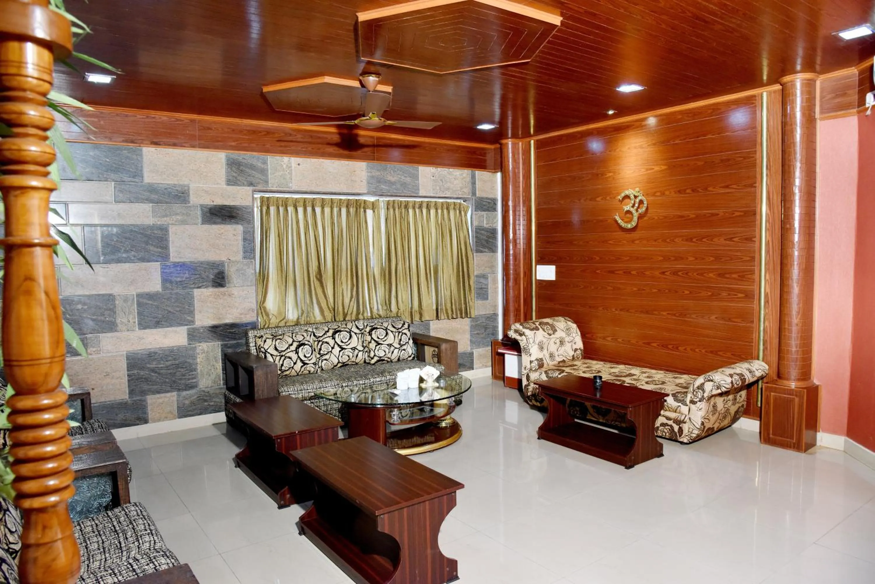 Seating area in Hotel Sharada International