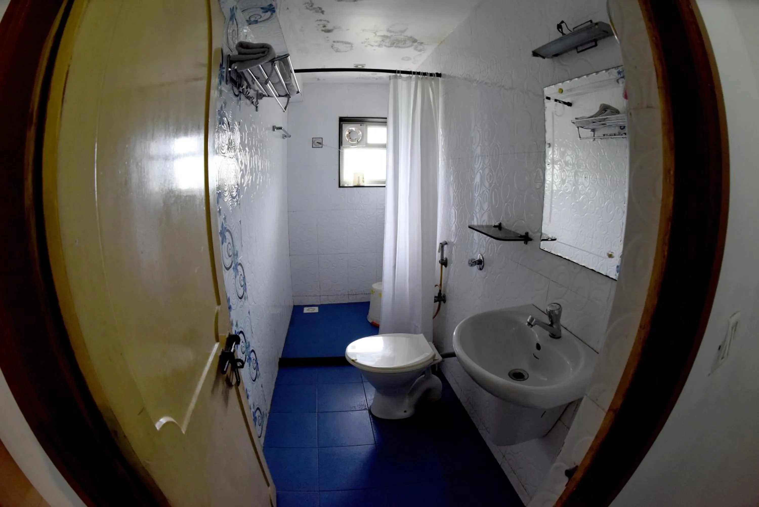 Bathroom in Hotel Sharada International