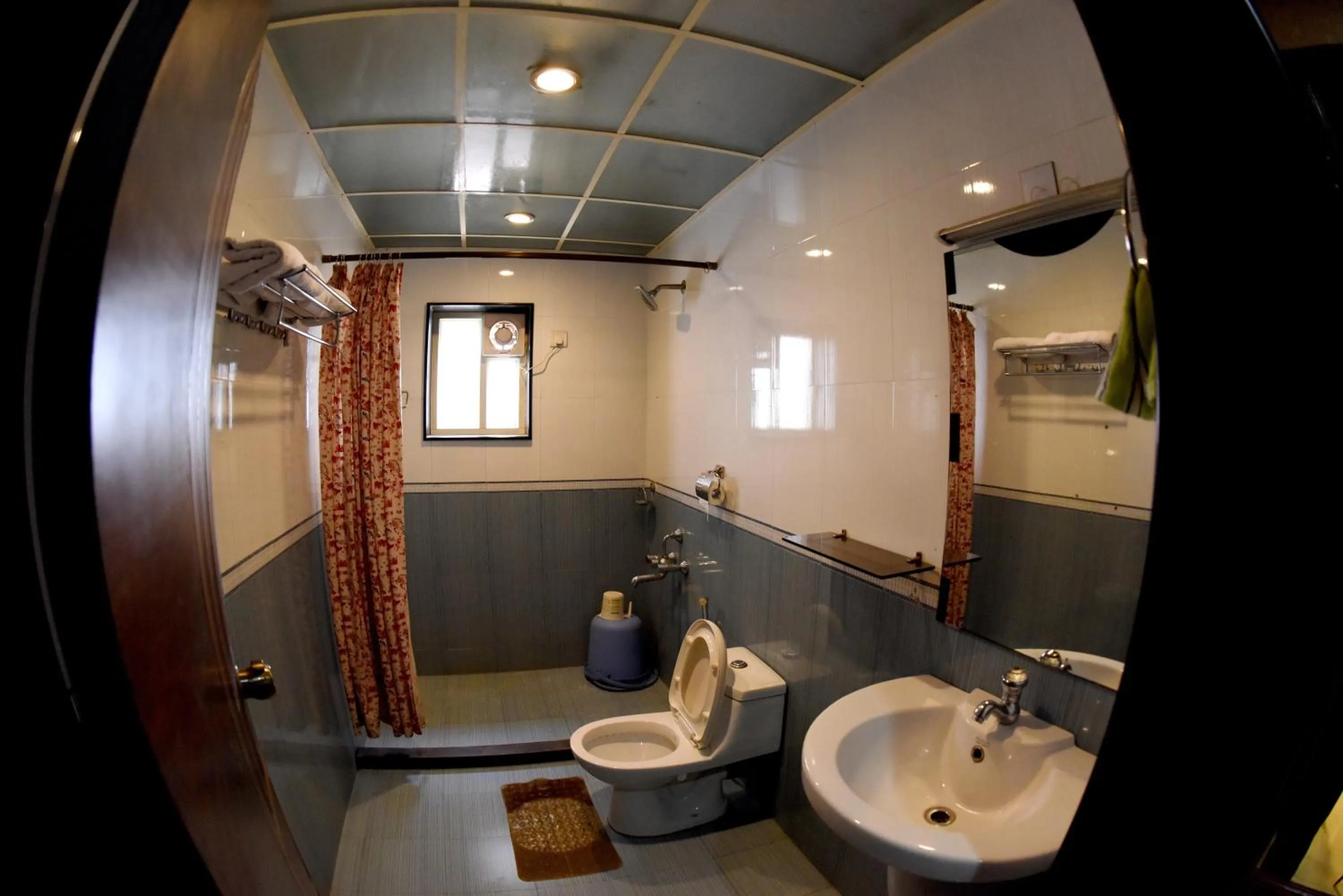 Bedroom in Hotel Sharada International