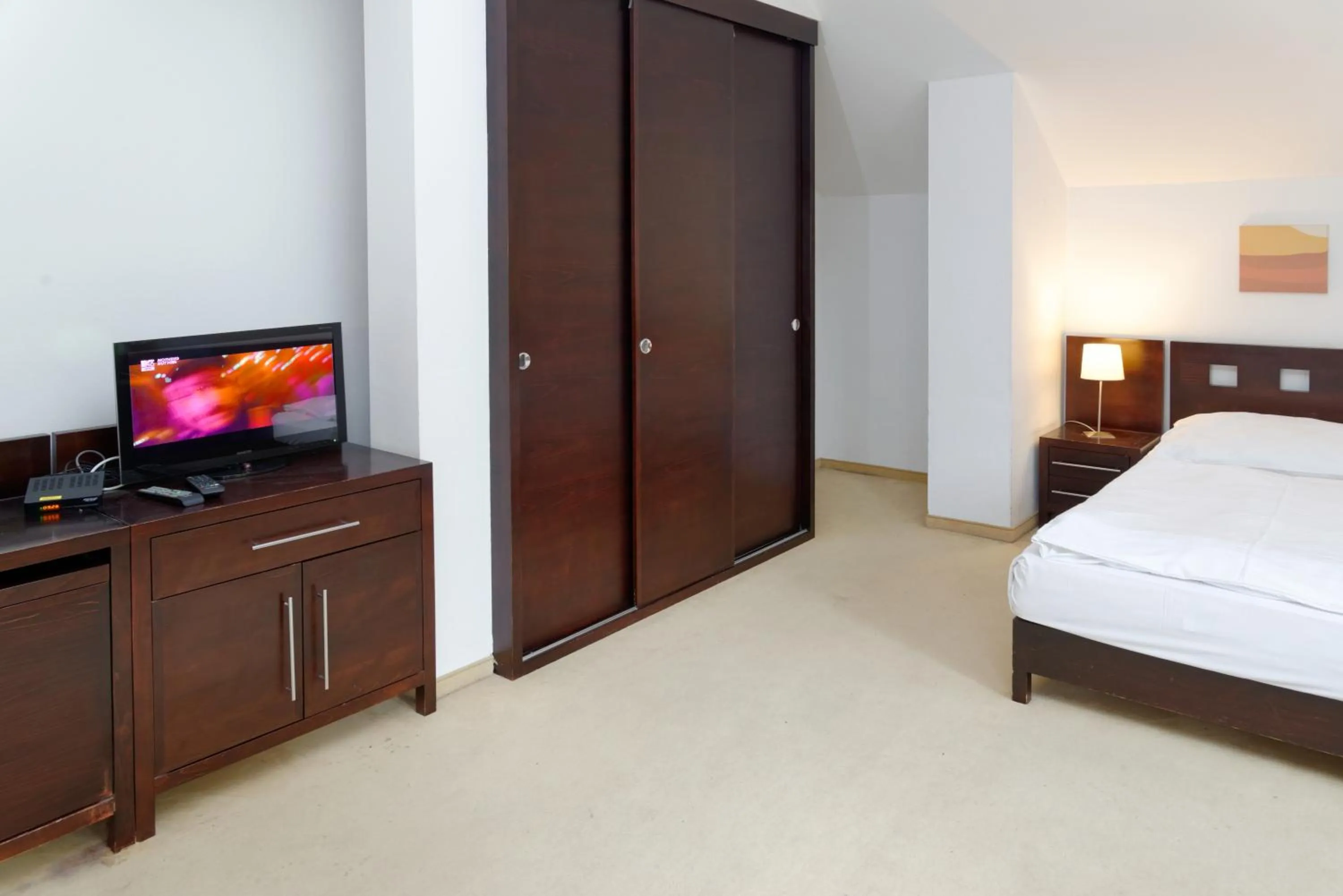 Bed in Hotel Tulipan