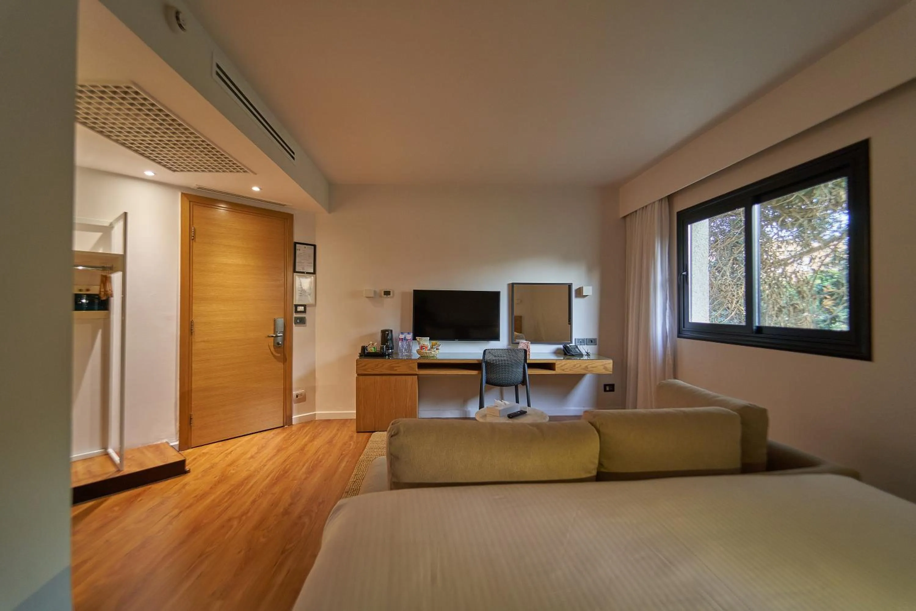 Seating area, Bed in New President Hotel Cairo