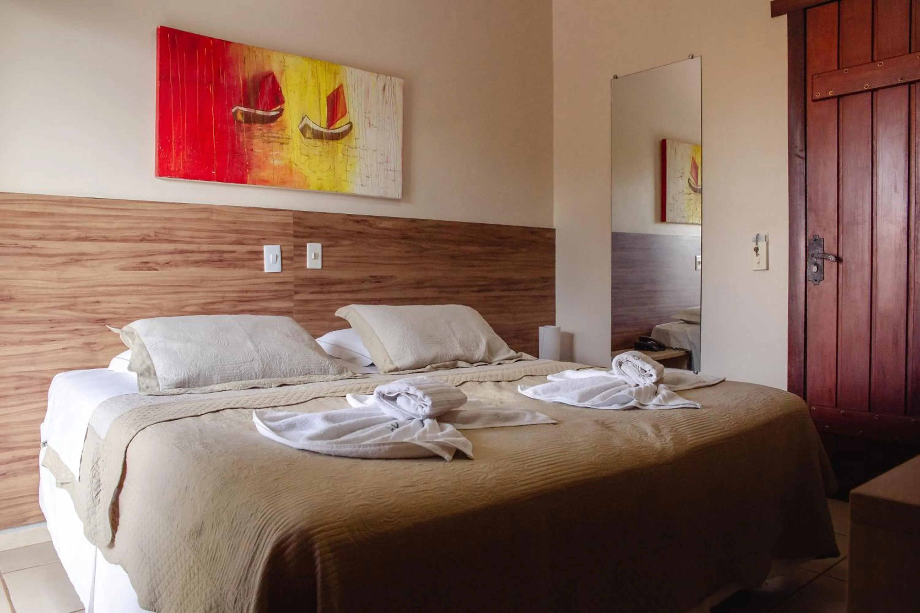 Bed in Pousada Chamamé