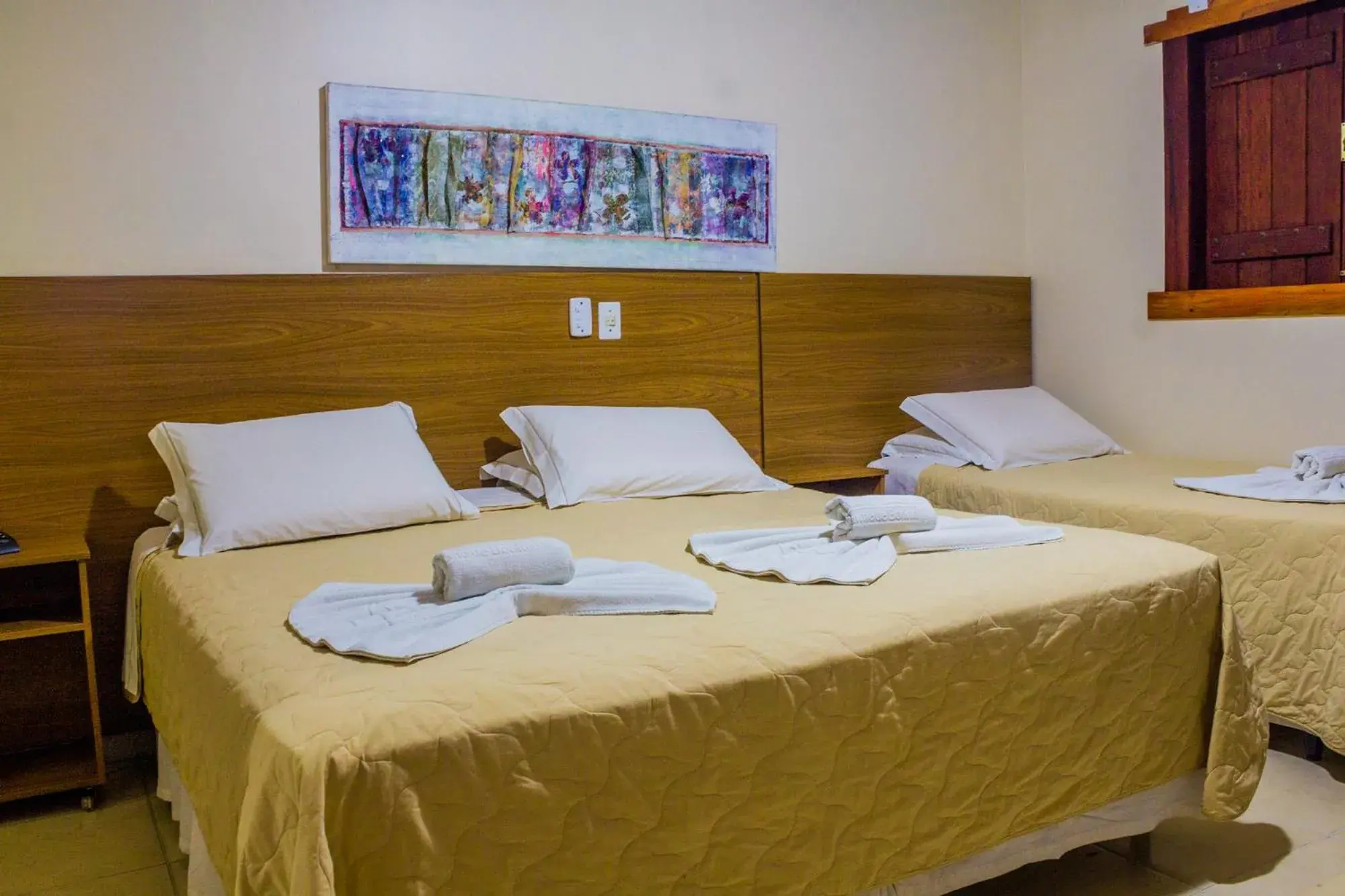 Triple Room in Pousada Chamamé Triple Room in Pousada Chamamé