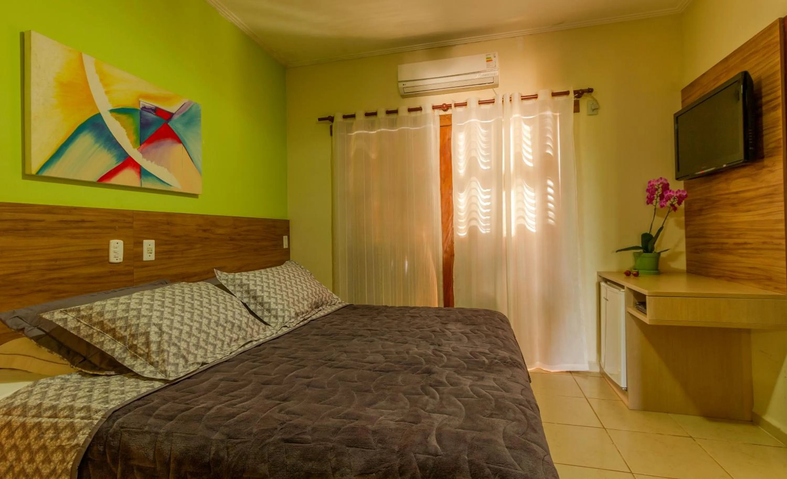 Bed in Pousada Chamamé