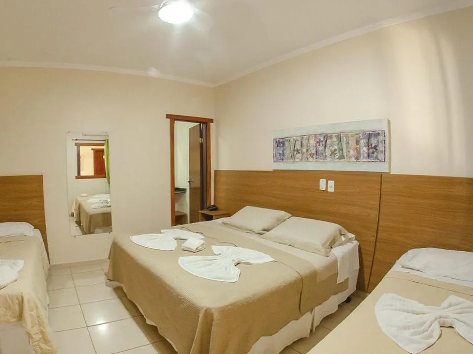 Bed in Pousada Chamamé