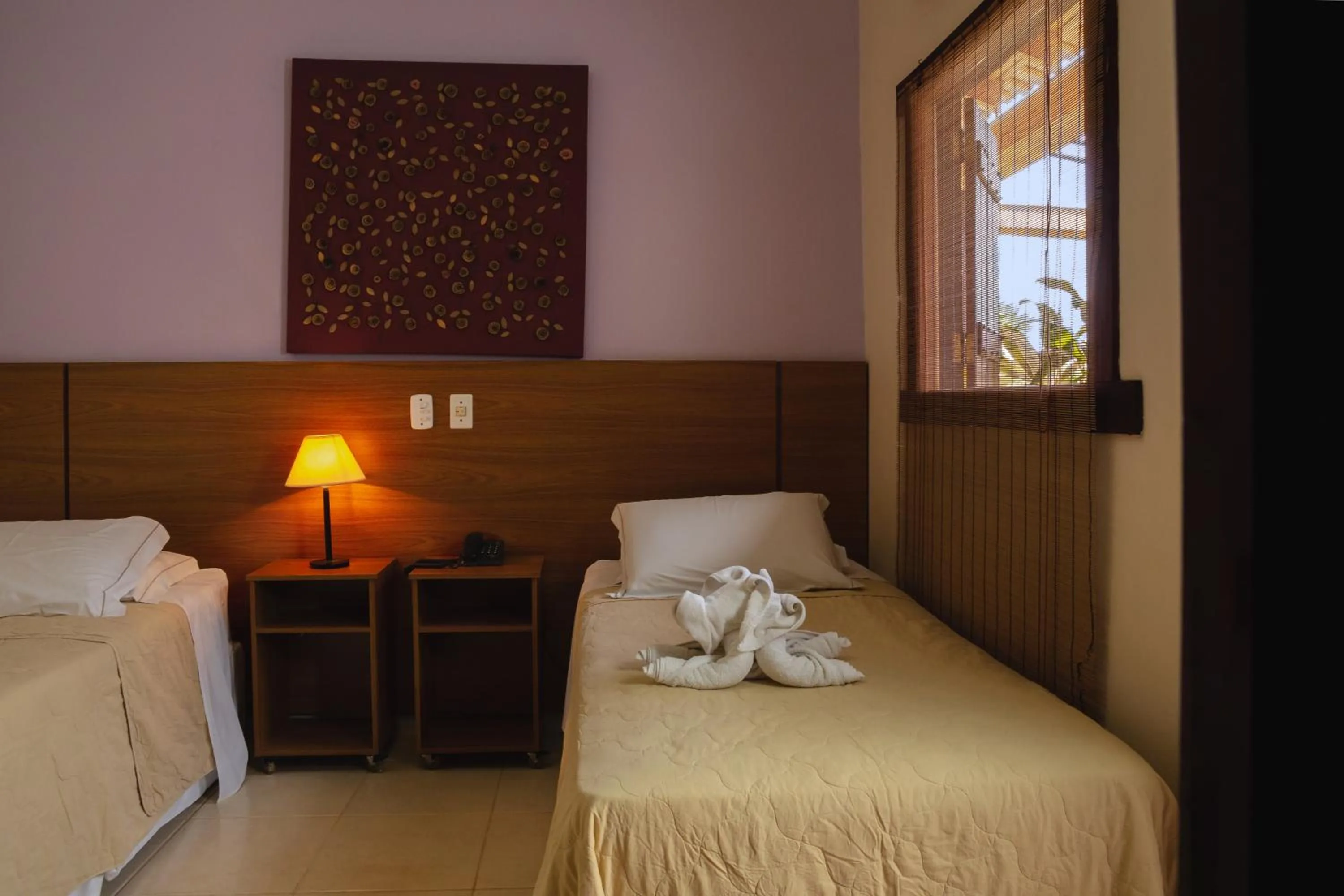 Bed in Pousada Chamamé