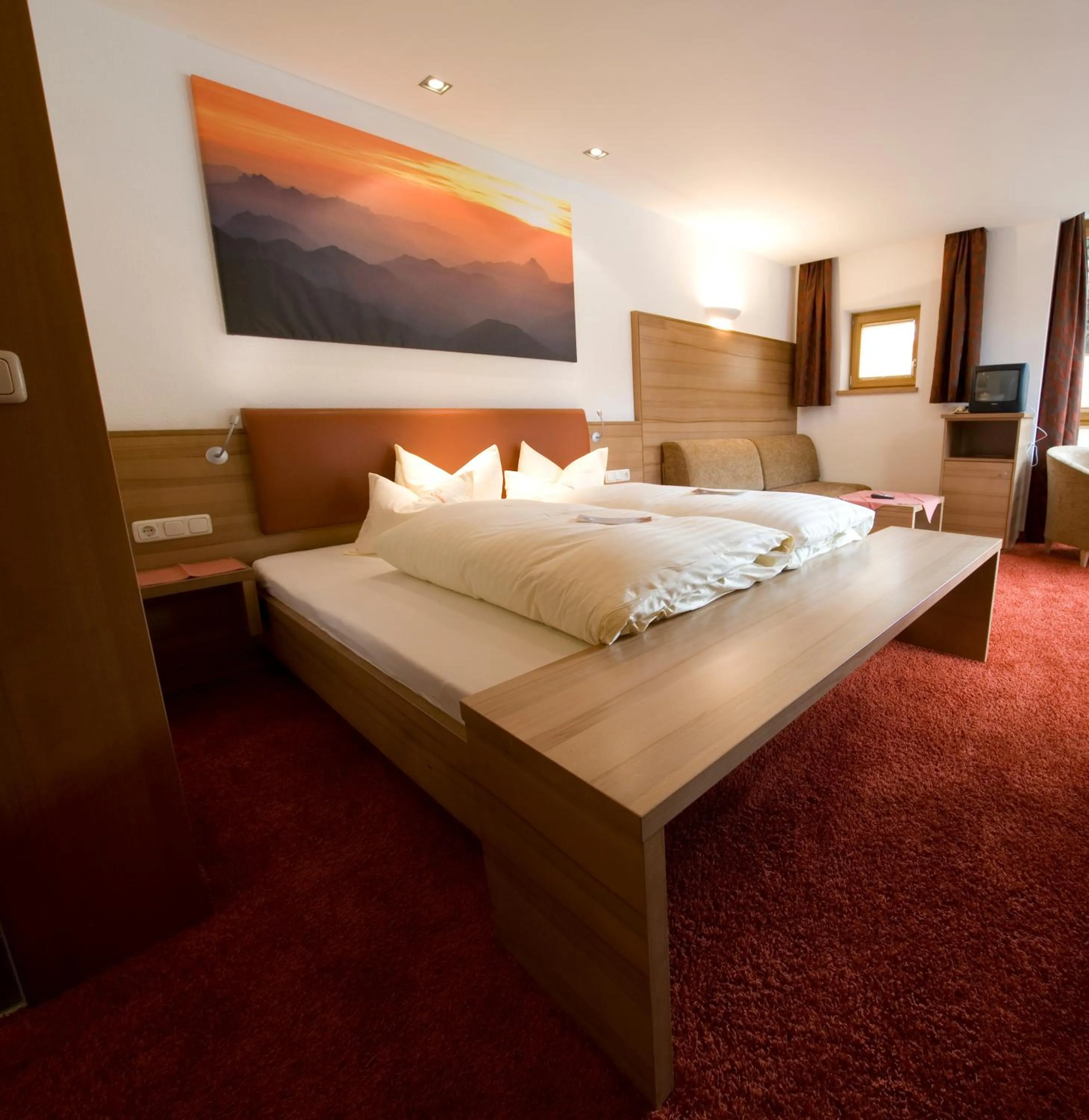 Bed in Hotel Garni Lawens