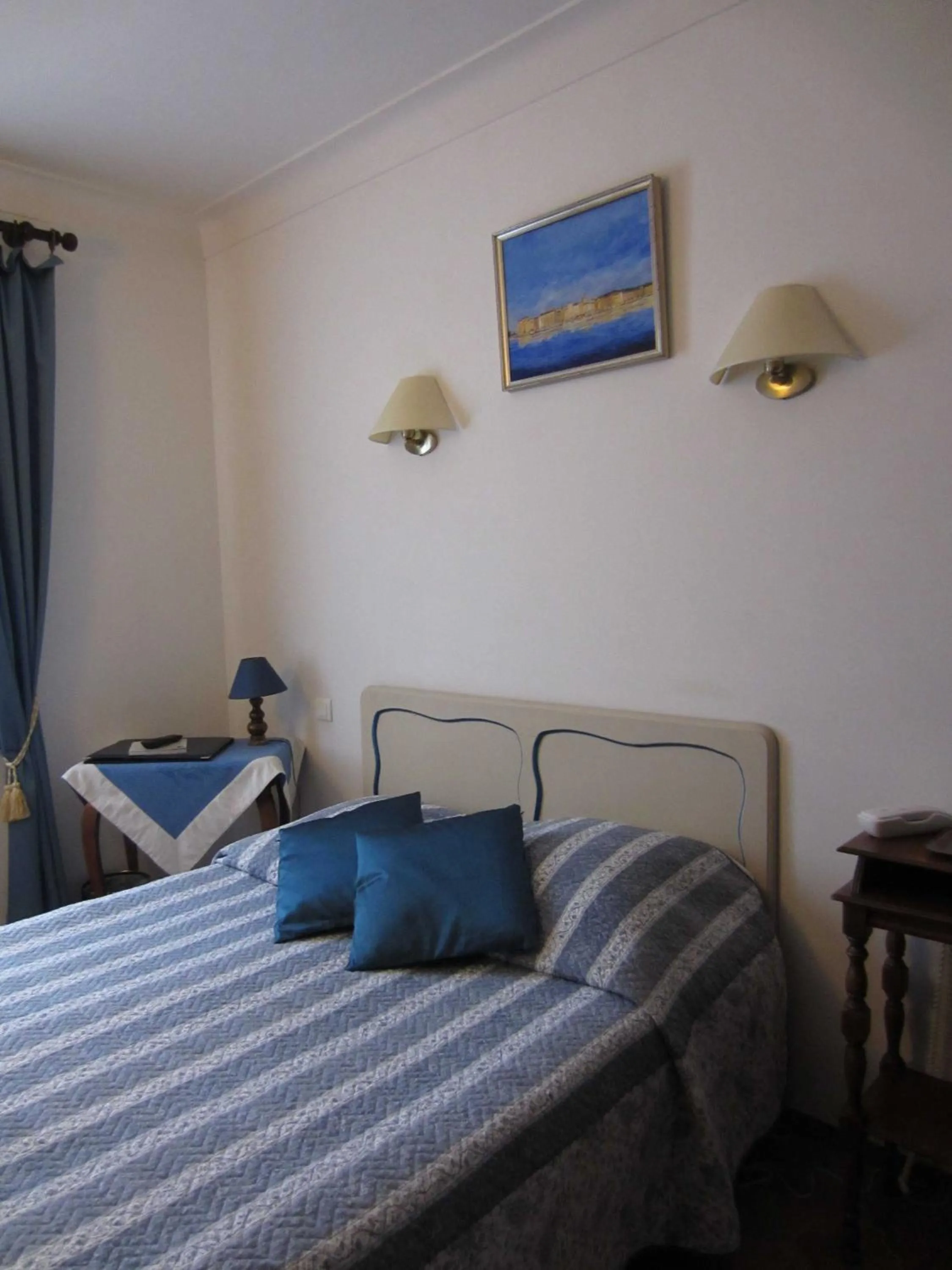 Bedroom in Hotel Belle Vue