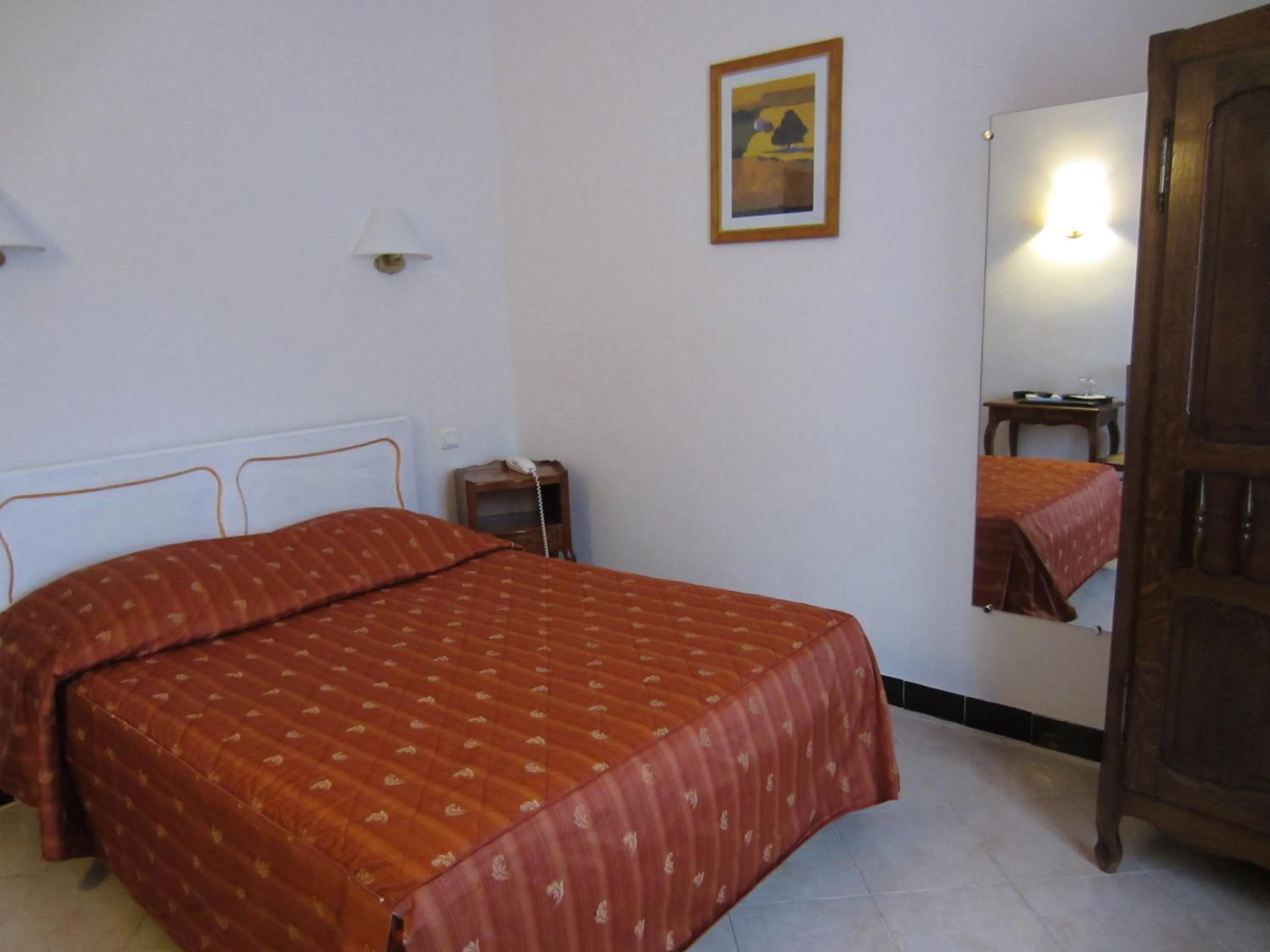 Bed in Hotel Belle Vue