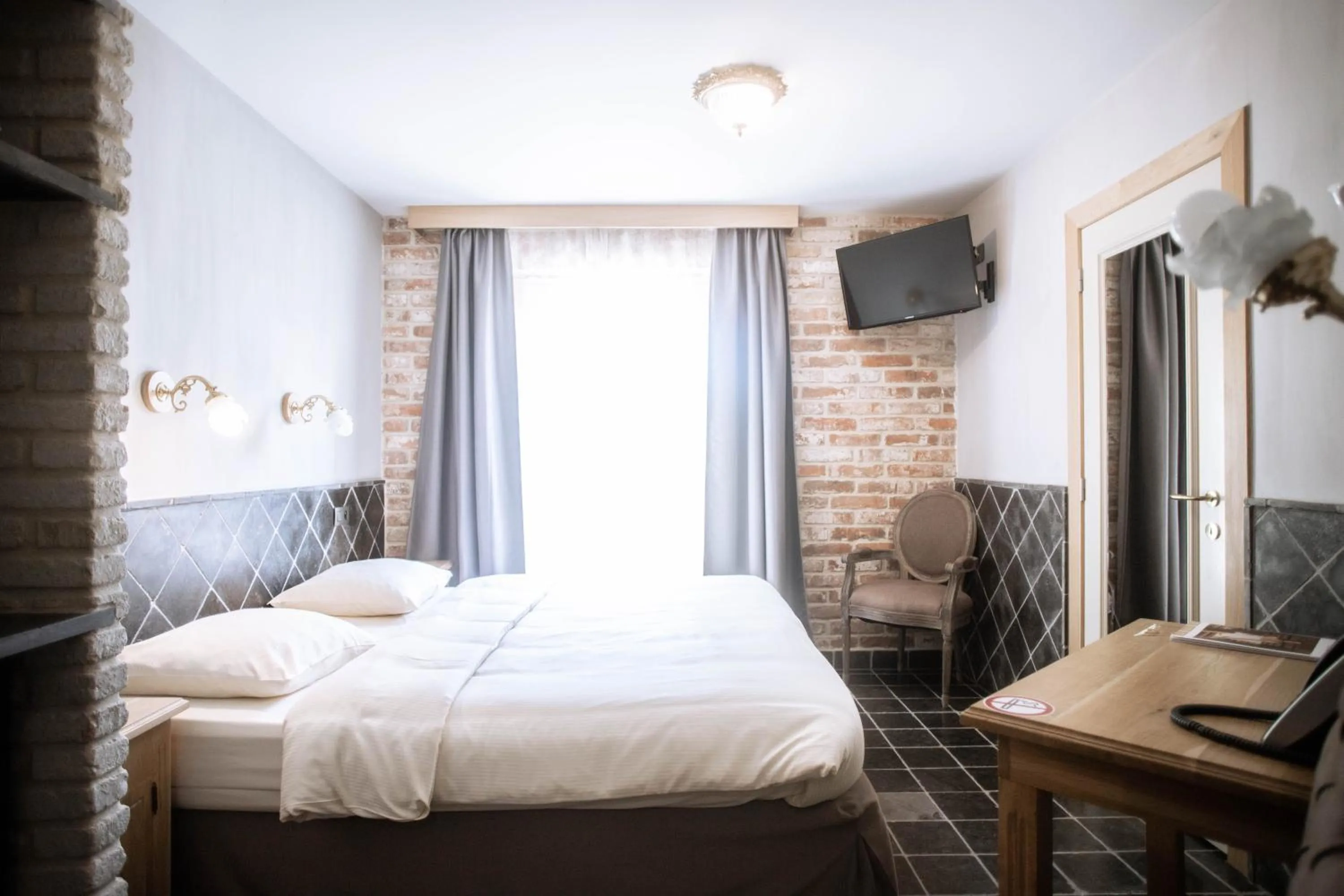 Photo of the whole room, Bed in Thermae Boetfort Hotel