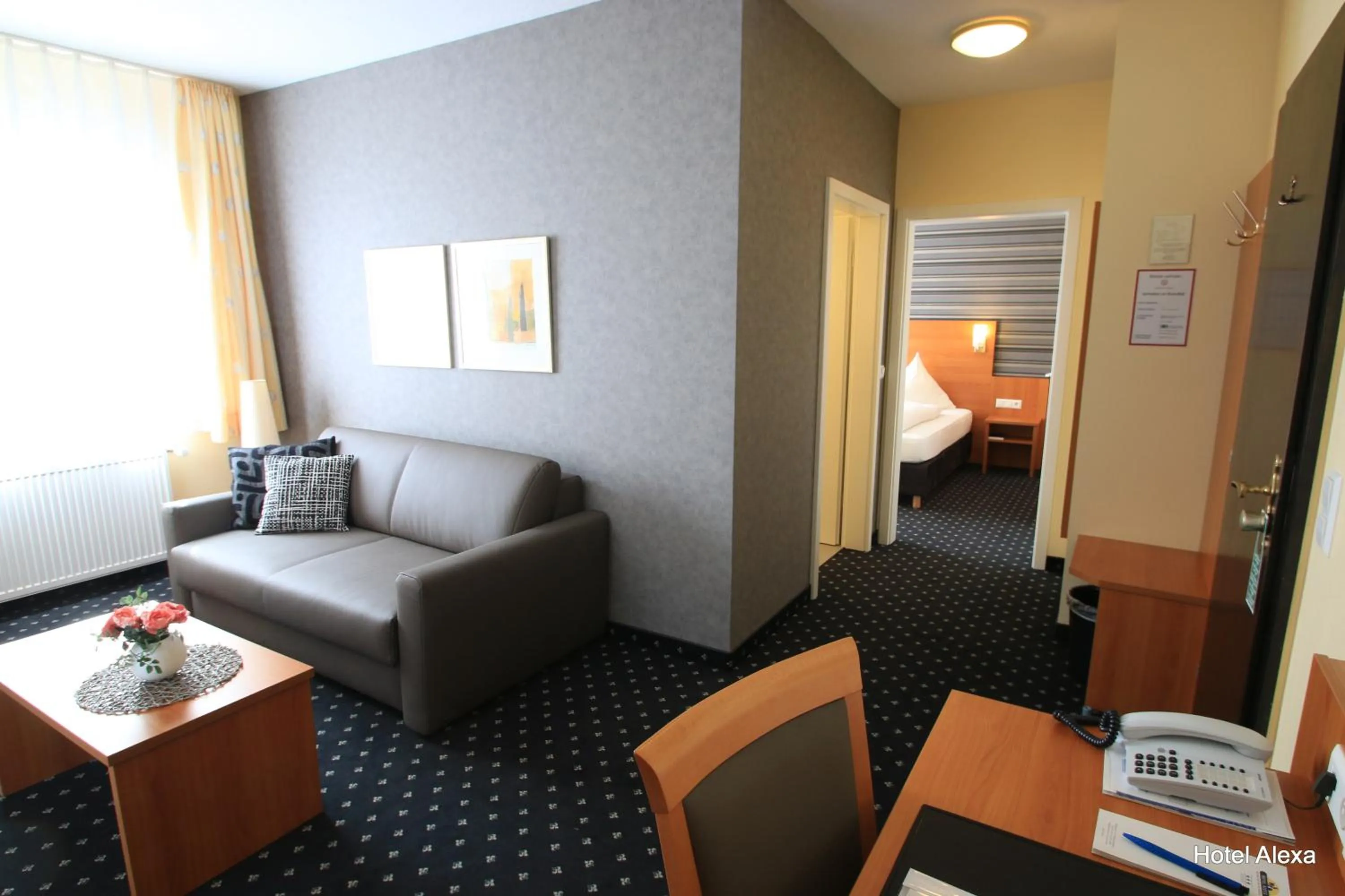 Living room in Hotel Alexa