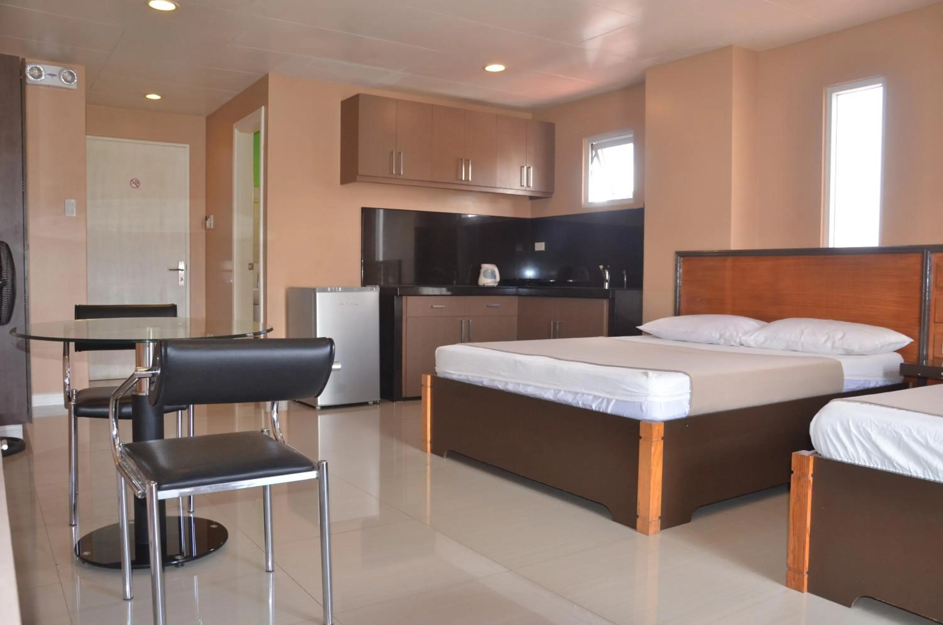 Kitchen or kitchenette, Bed in RL Veranda Suite