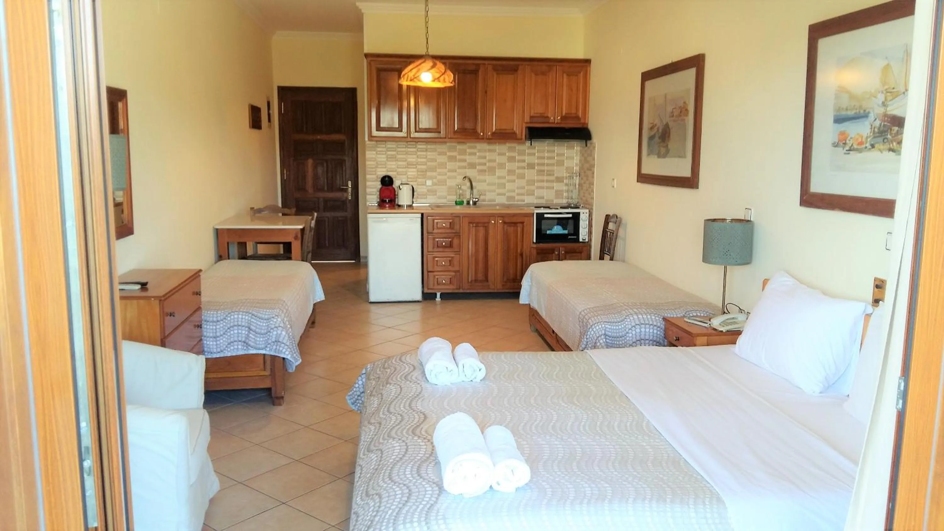 Kitchen or kitchenette, Bed in PHILIPPOS Hotel Apartments