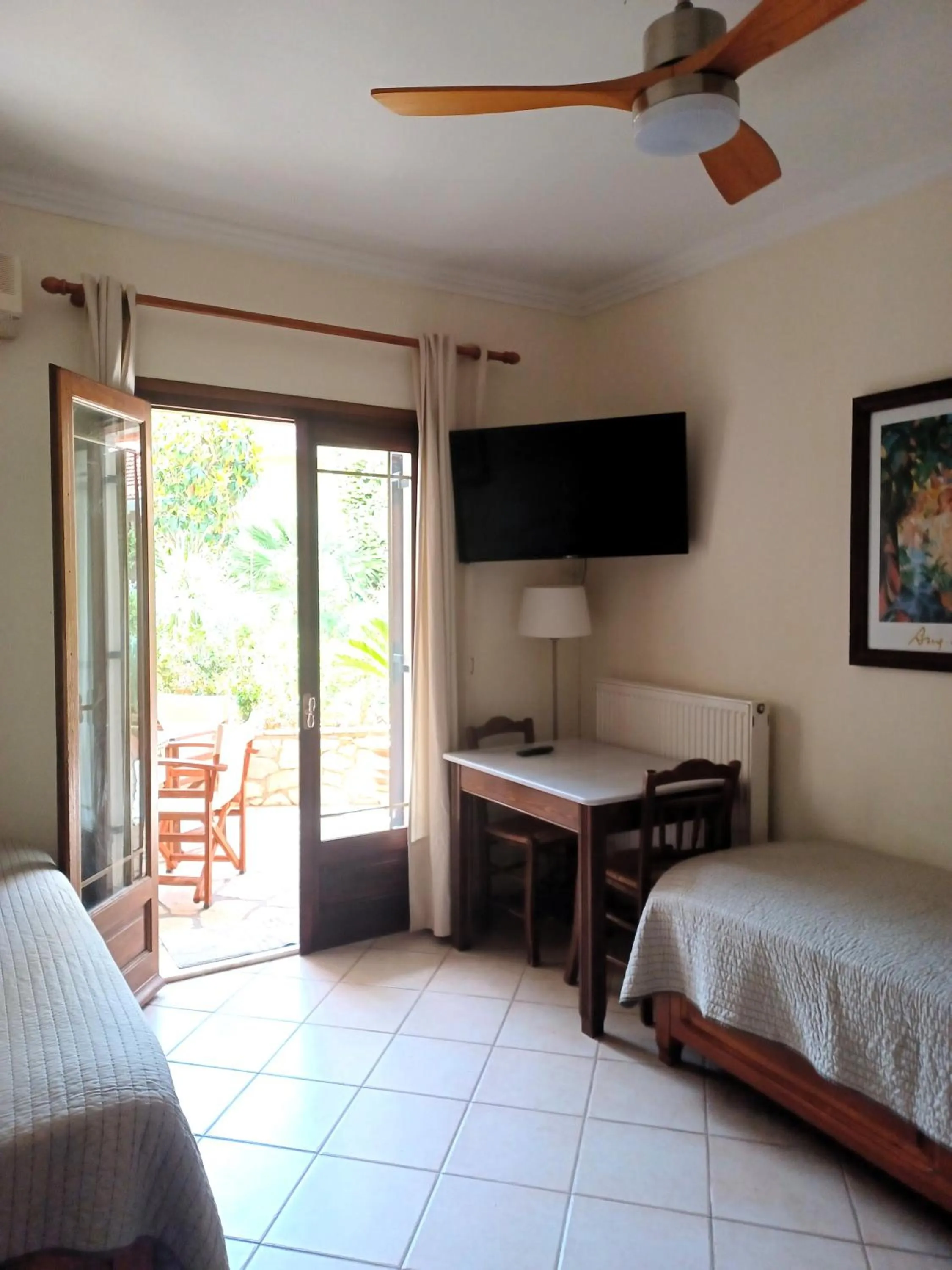 Seating area, Bed in PHILIPPOS Hotel Apartments